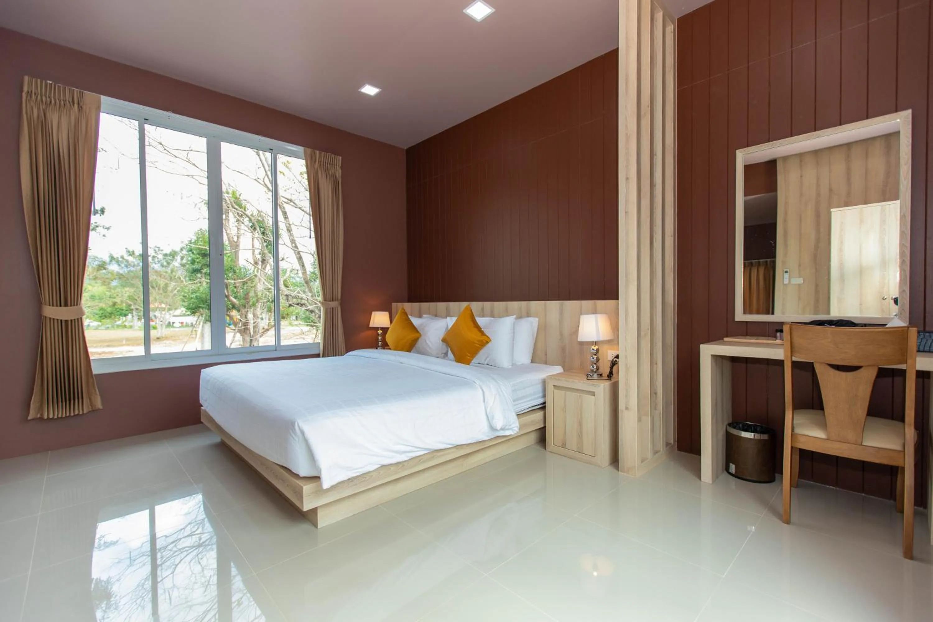 Photo of the whole room, Bed in The Chamuang Forest