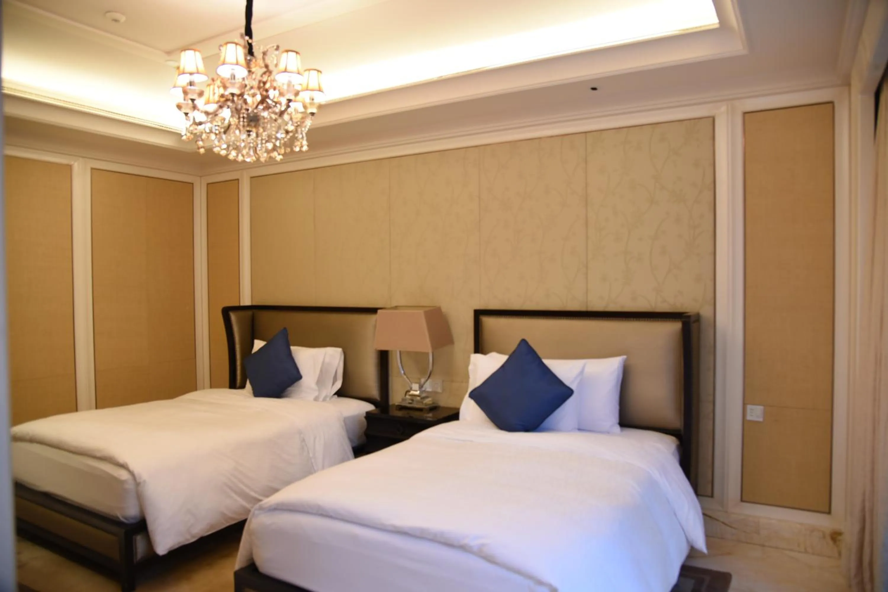 Property logo or sign, Bed in Wanda Reign Resort & Villas Sanya Haitang Bay