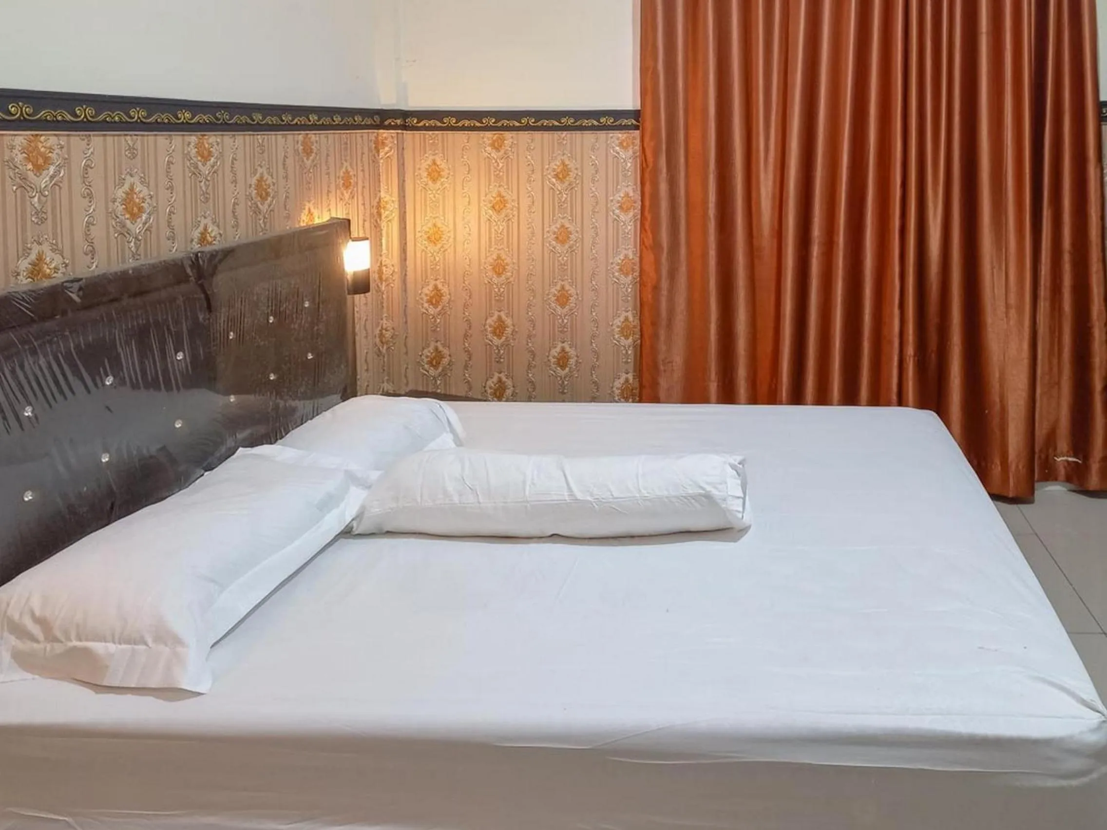 Bedroom, Bed in Homestay Singgasana Mitra RedDoorz