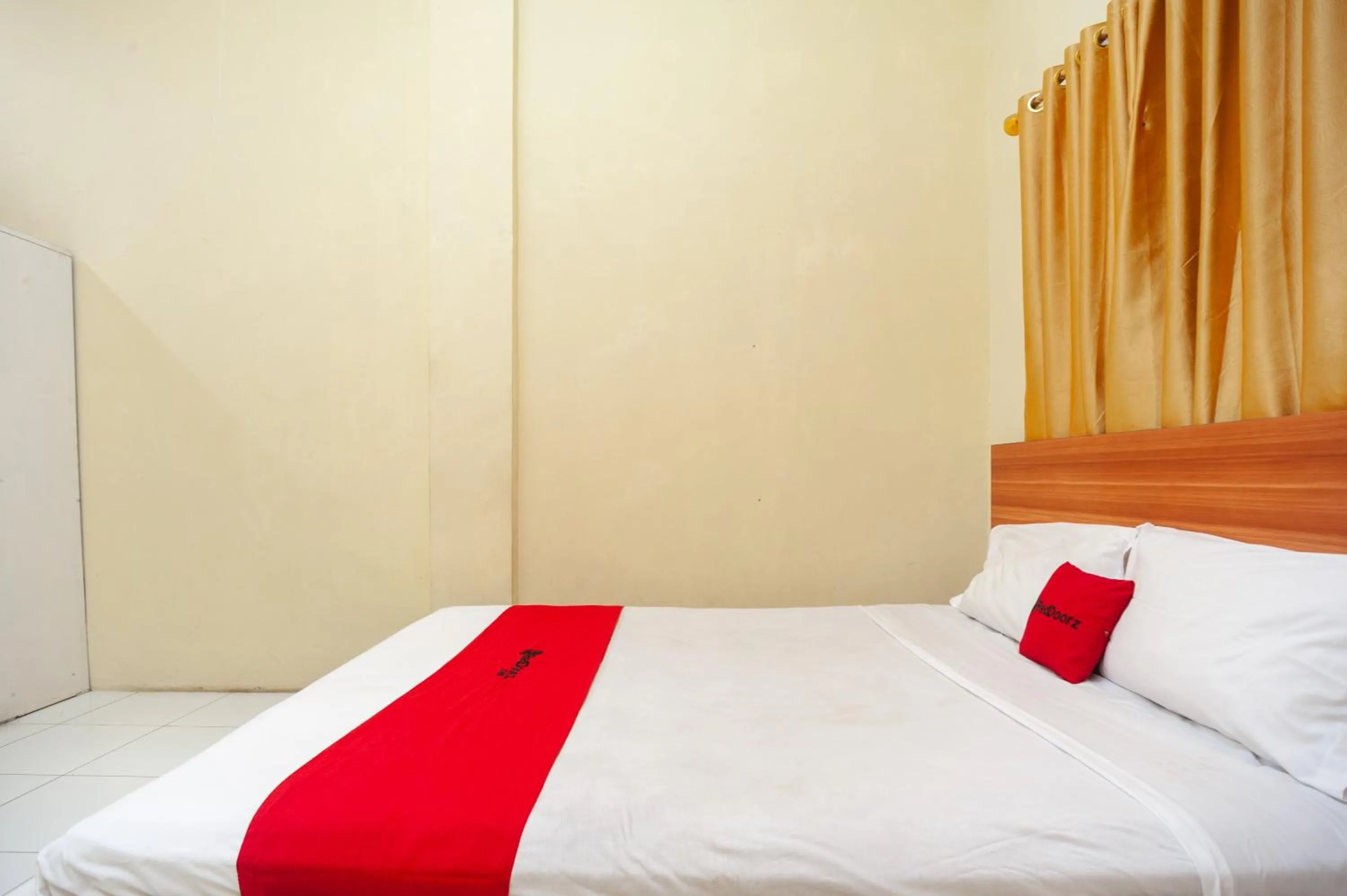 Bed in RedDoorz near Universitas Muhammadiyah Pringsewu