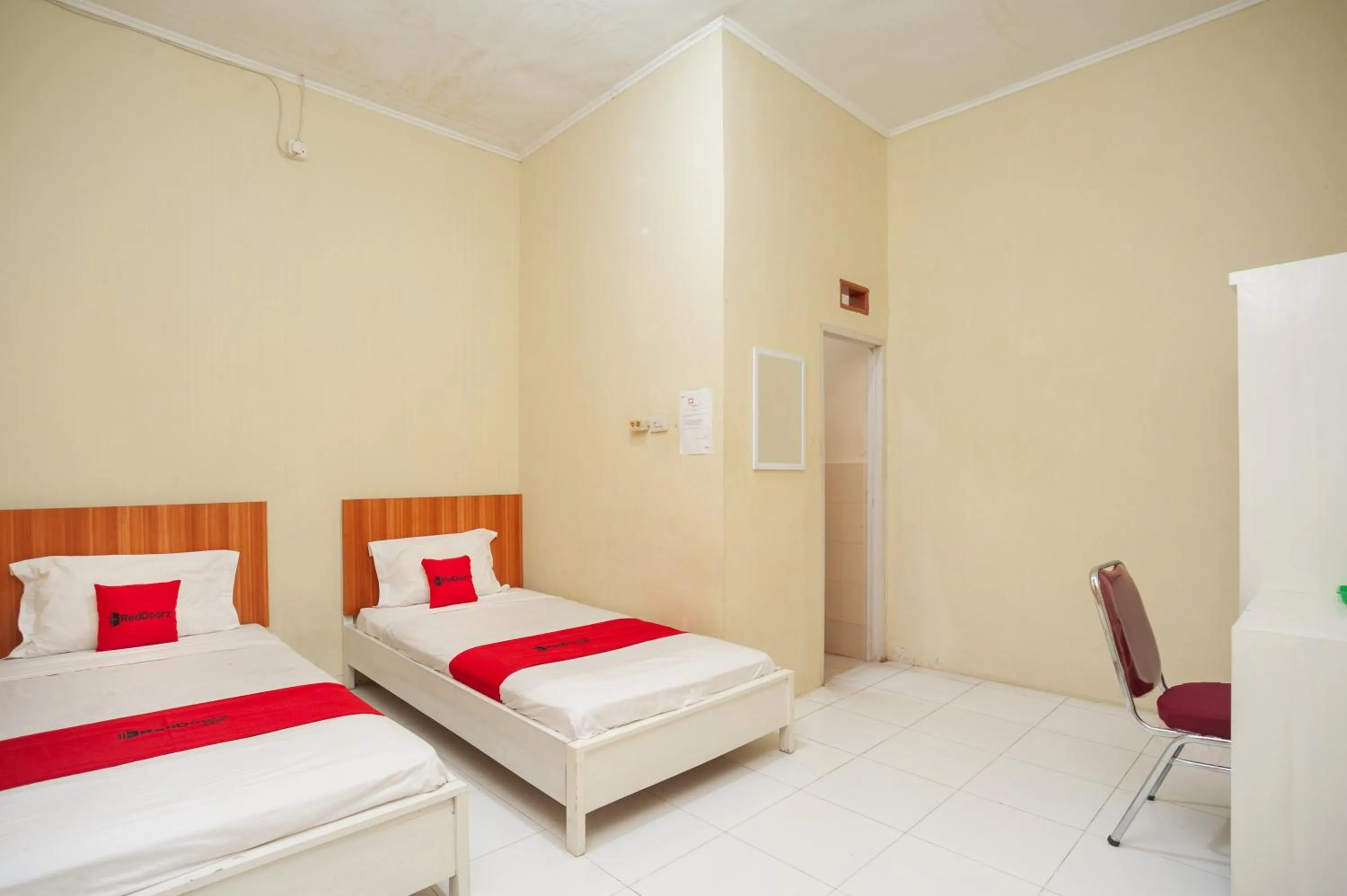 Bed in RedDoorz near Universitas Muhammadiyah Pringsewu