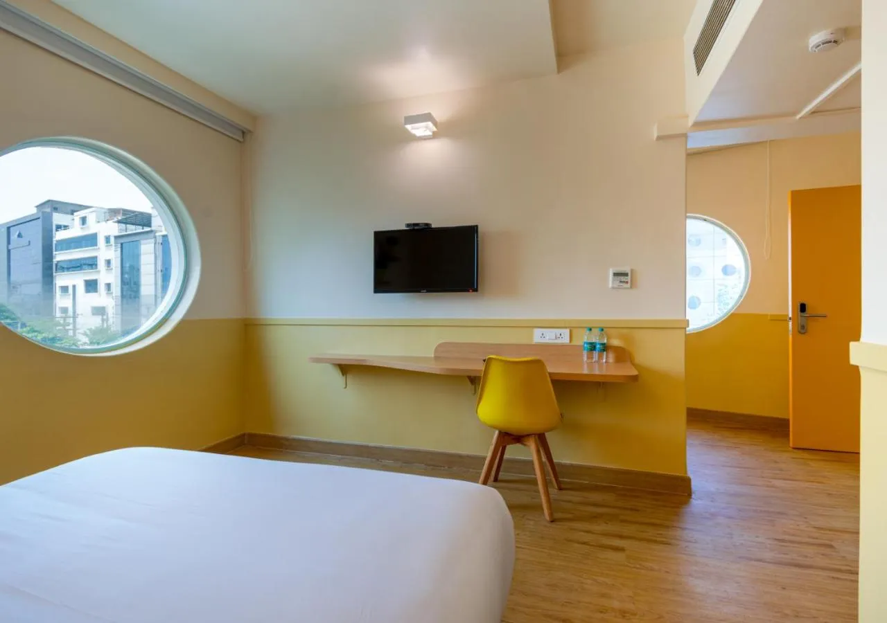 TV and multimedia, Bed in Bloom Hotel - HITEC City