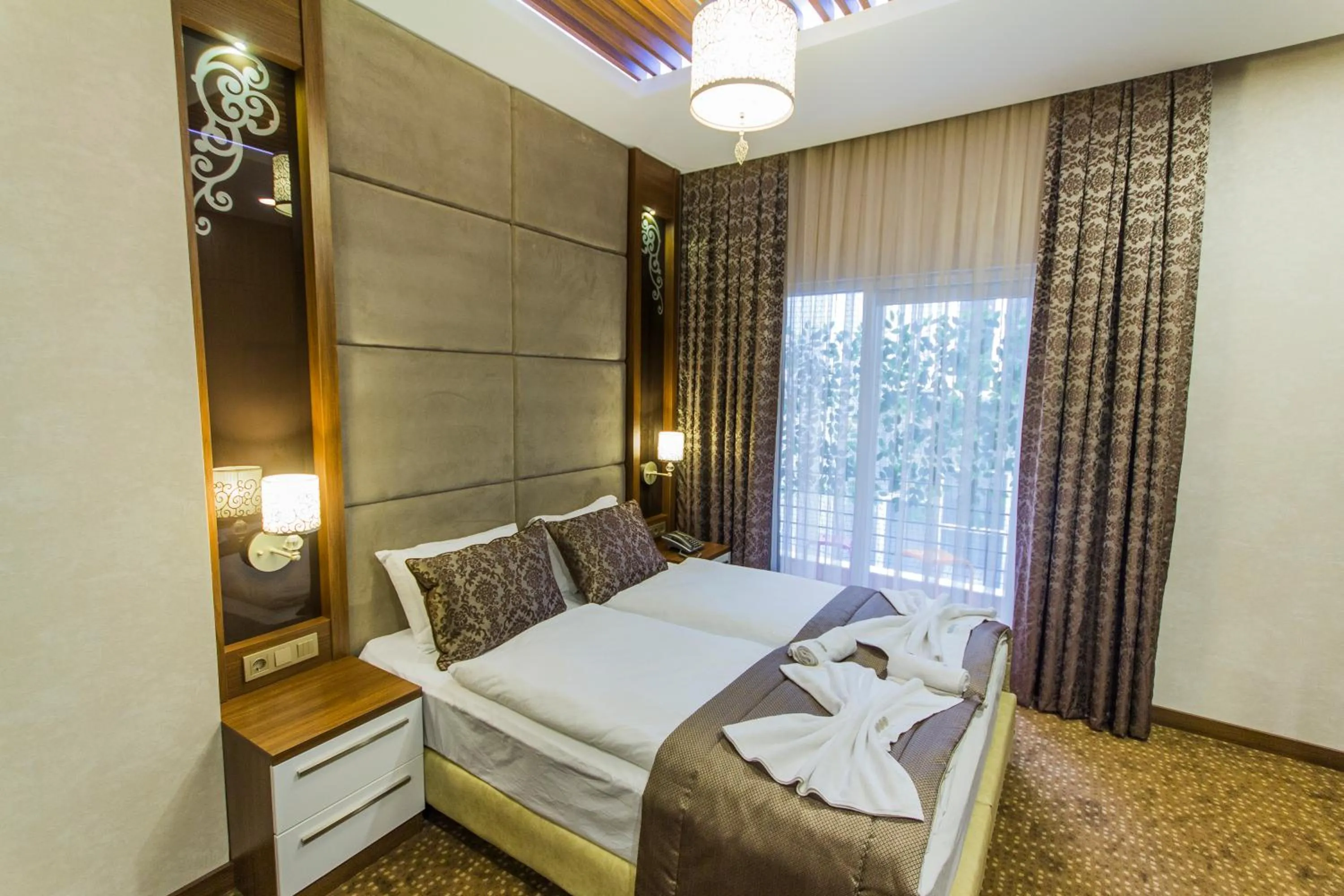 Bed in Taksim Cihangir Fidan Residence Hotel