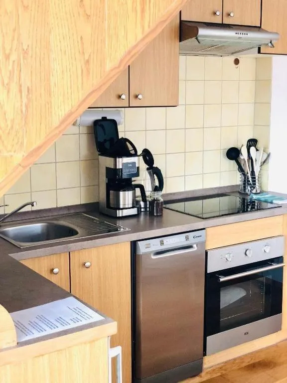Kitchen or kitchenette in Apartmán U Tří smrků