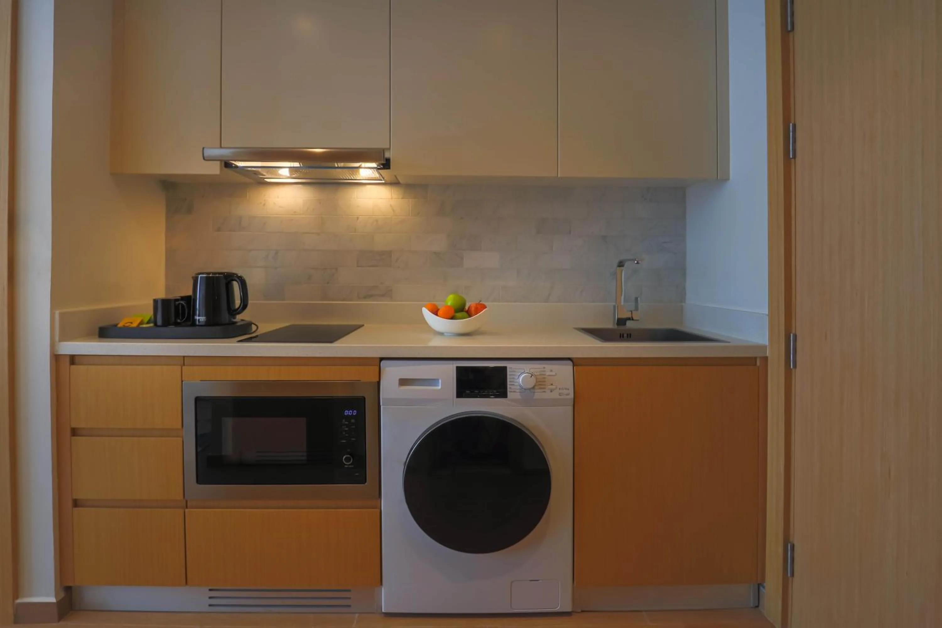 Kitchen or kitchenette in Adagio Jumeirah Village Triangle