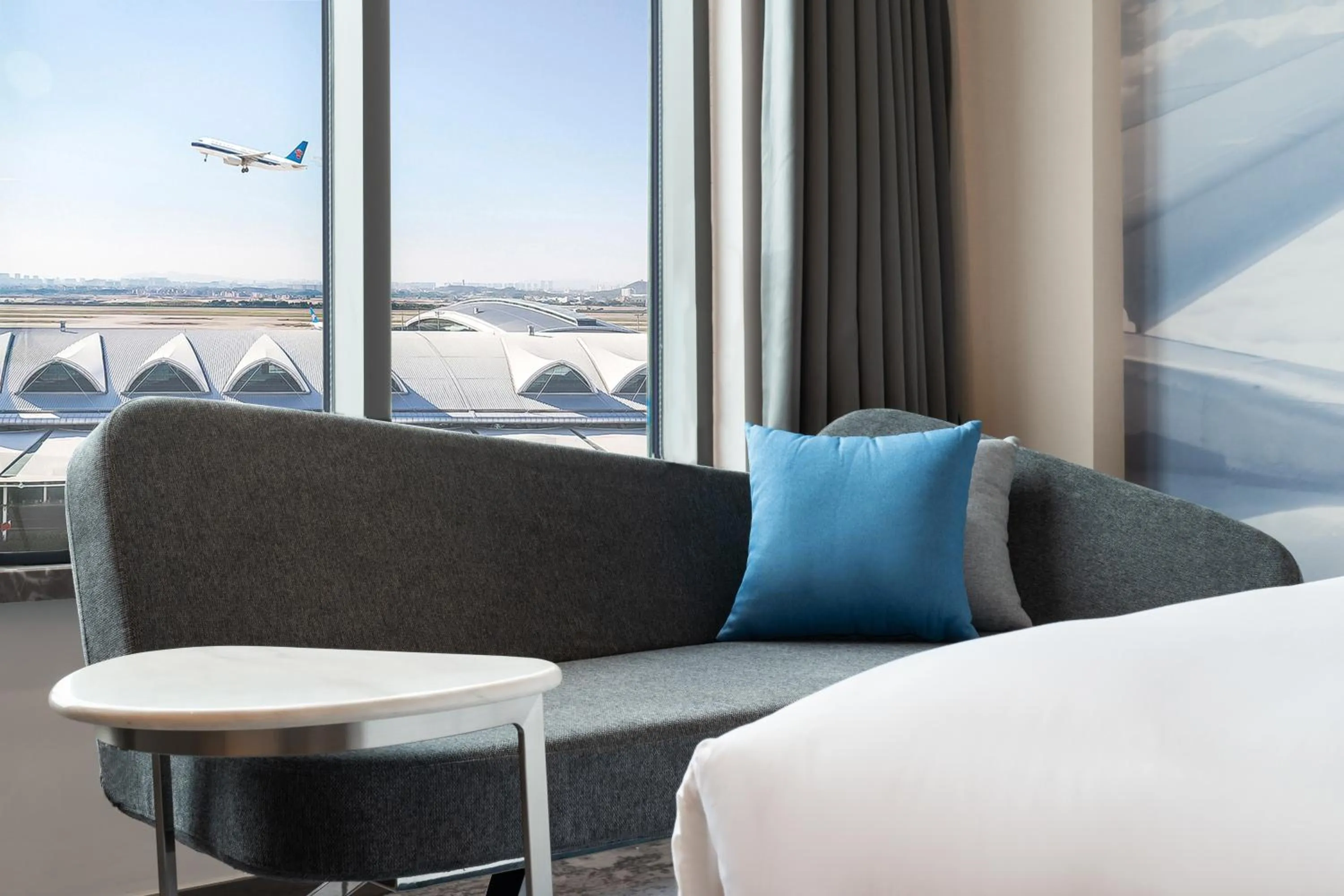 Living room, Bed in Novotel Guangzhou Baiyun Airport - Canton Fair Free Shuttle Bus & Official Registration Agency