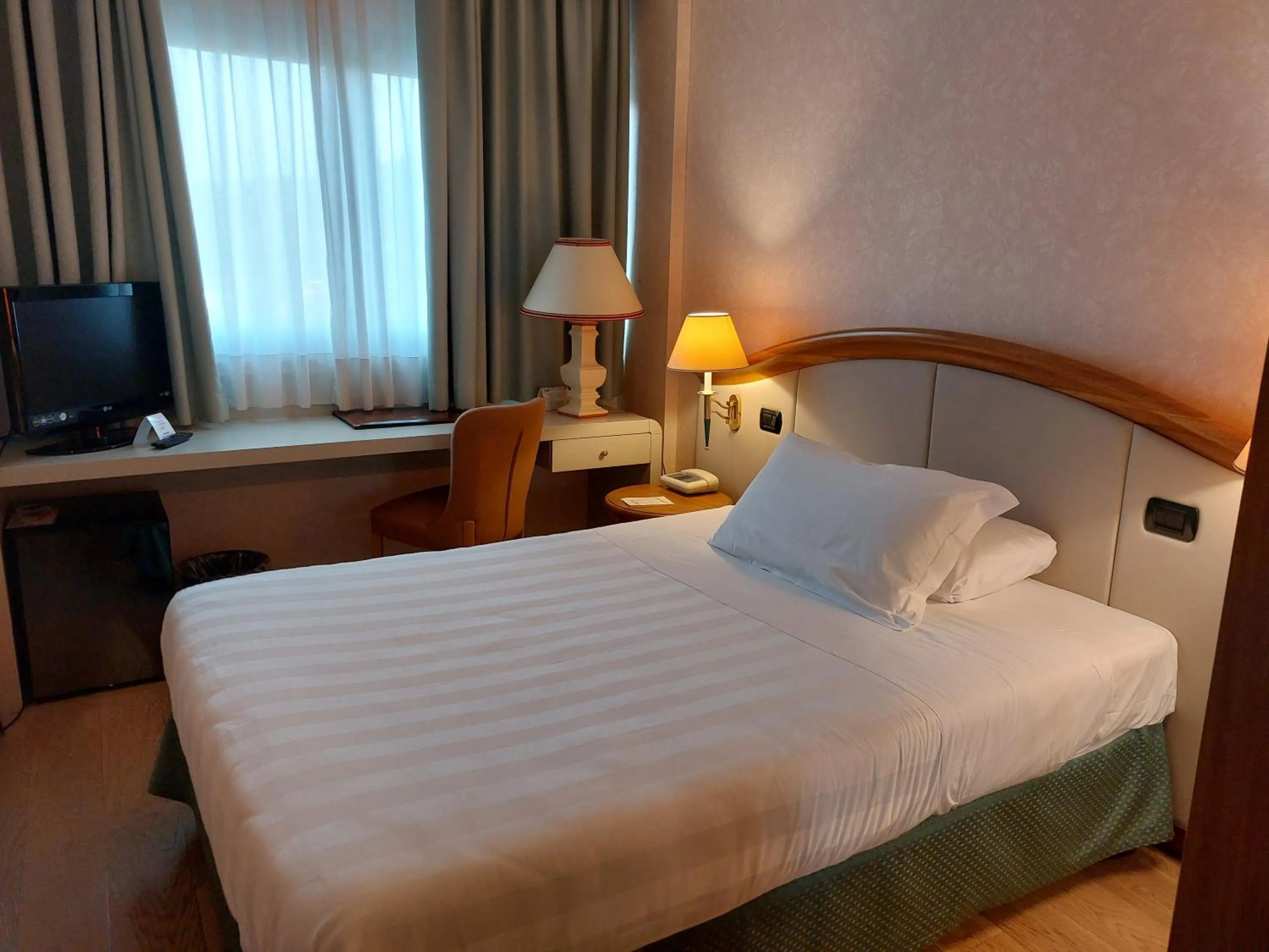 Bed in Perugia Plaza Hotel