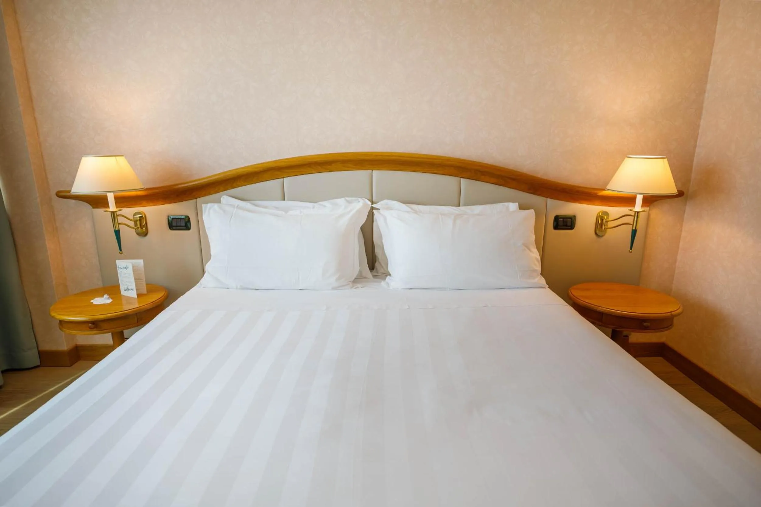 Bed in Perugia Plaza Hotel