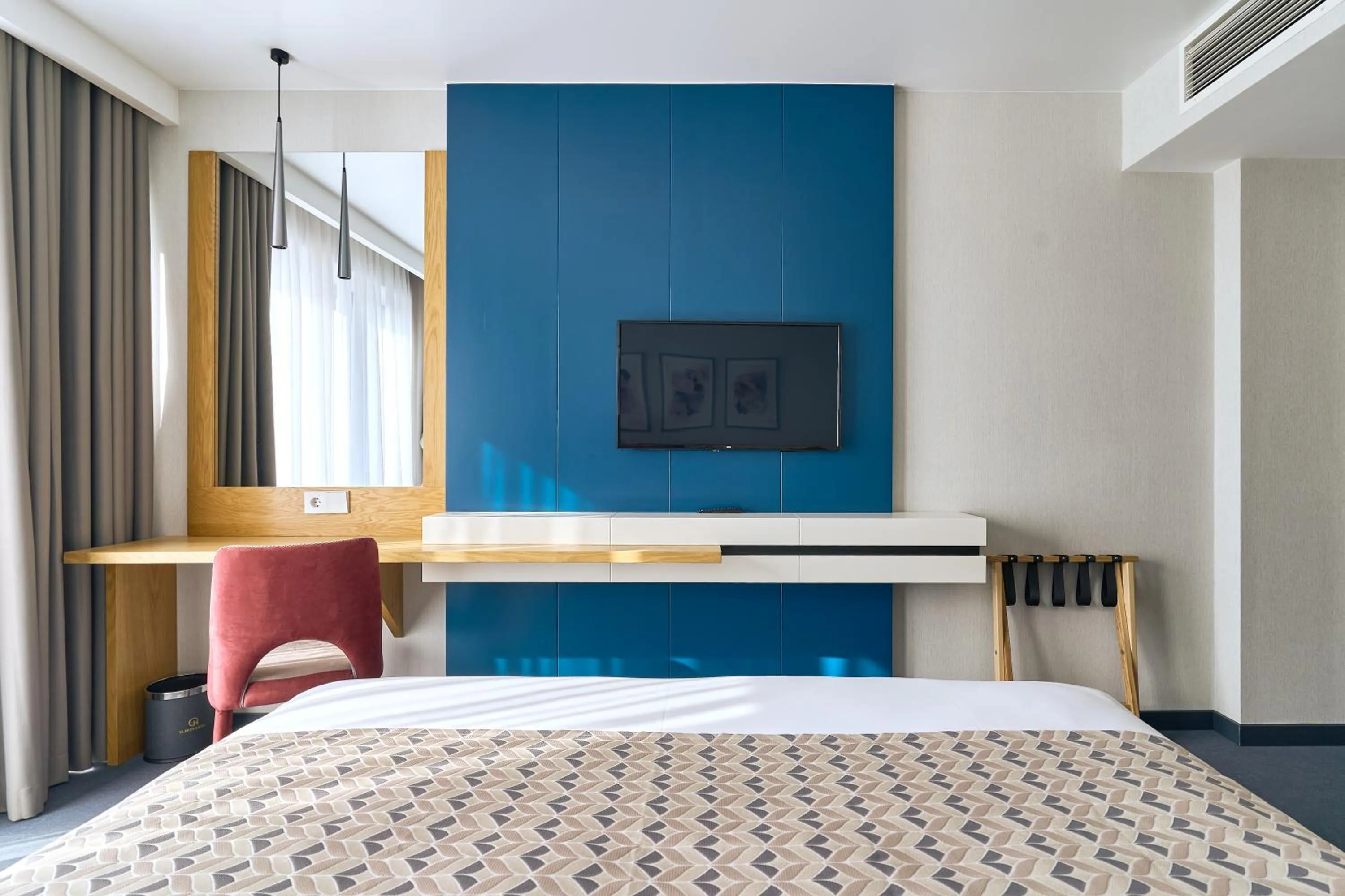 Bed in Clocks Hotel Tbilisi