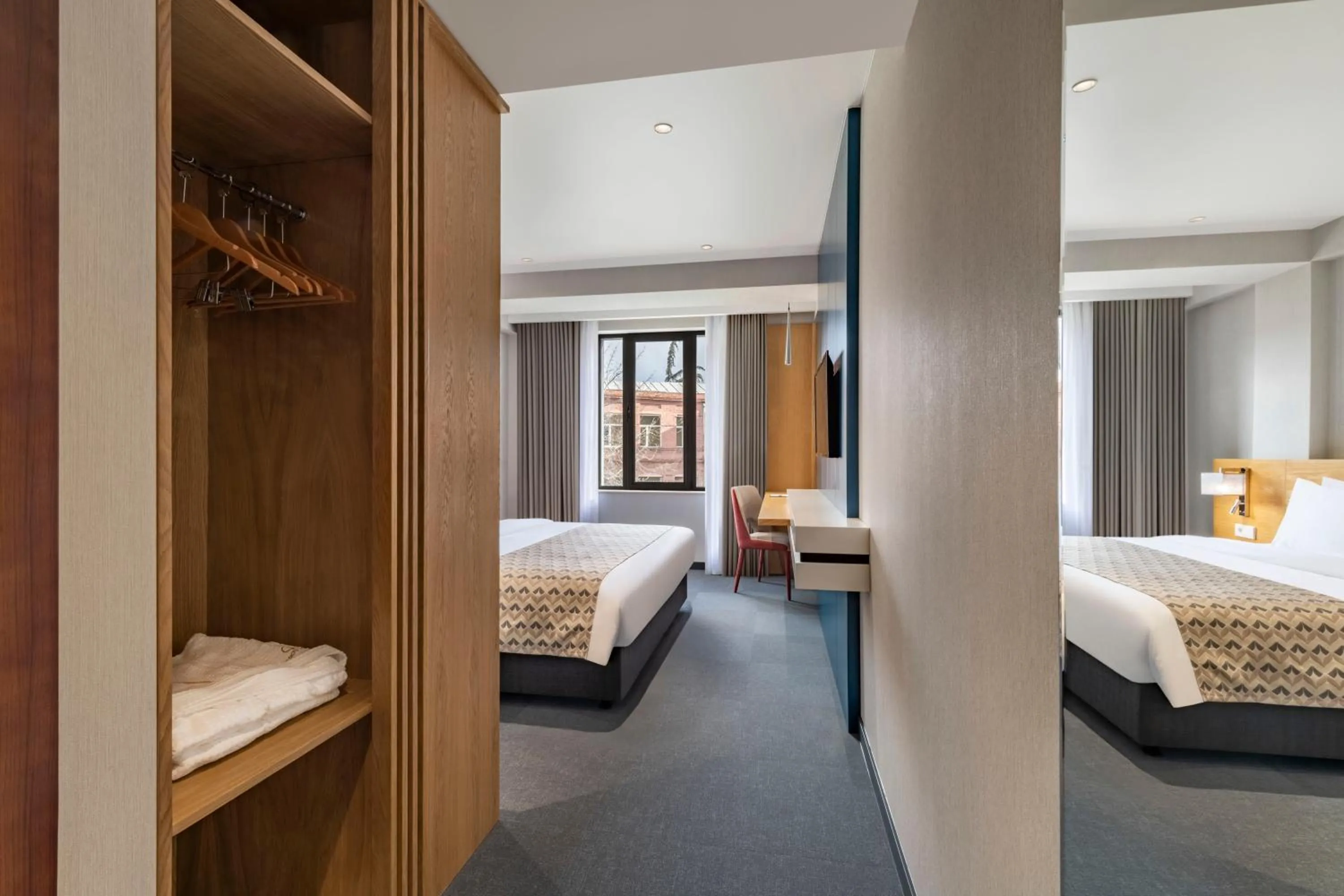 Bed in Clocks Hotel Tbilisi