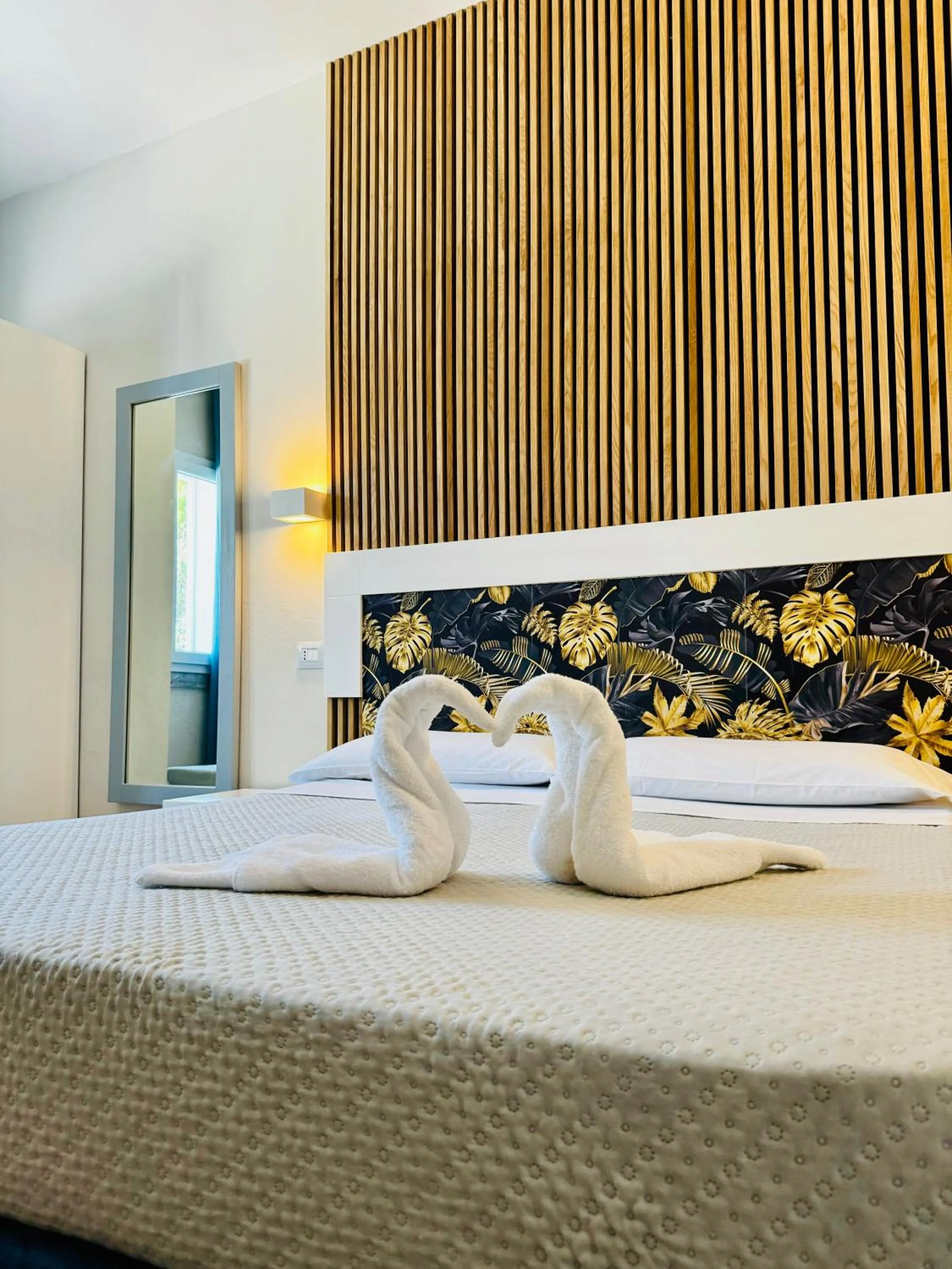 Bed in Hotel Lo Scoglio