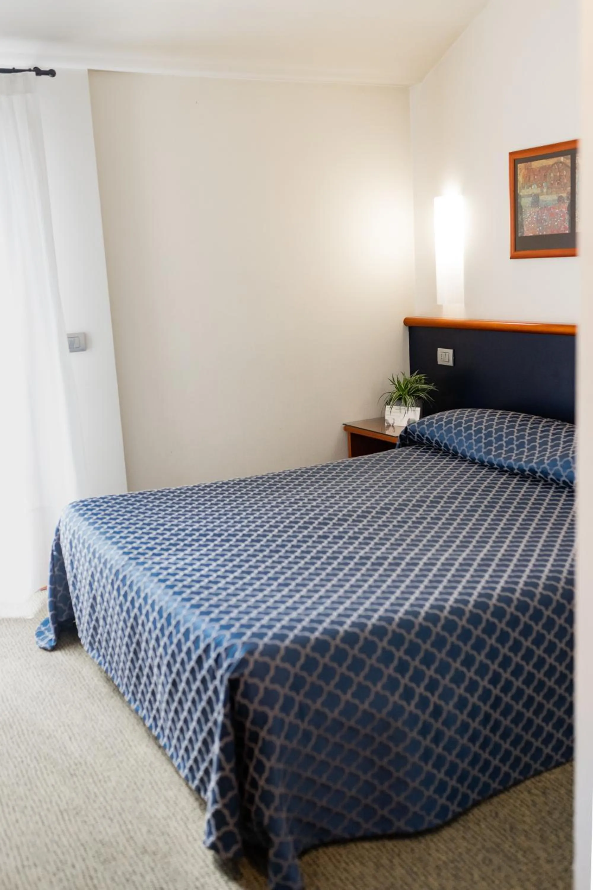 Bed in Hotel Crystal