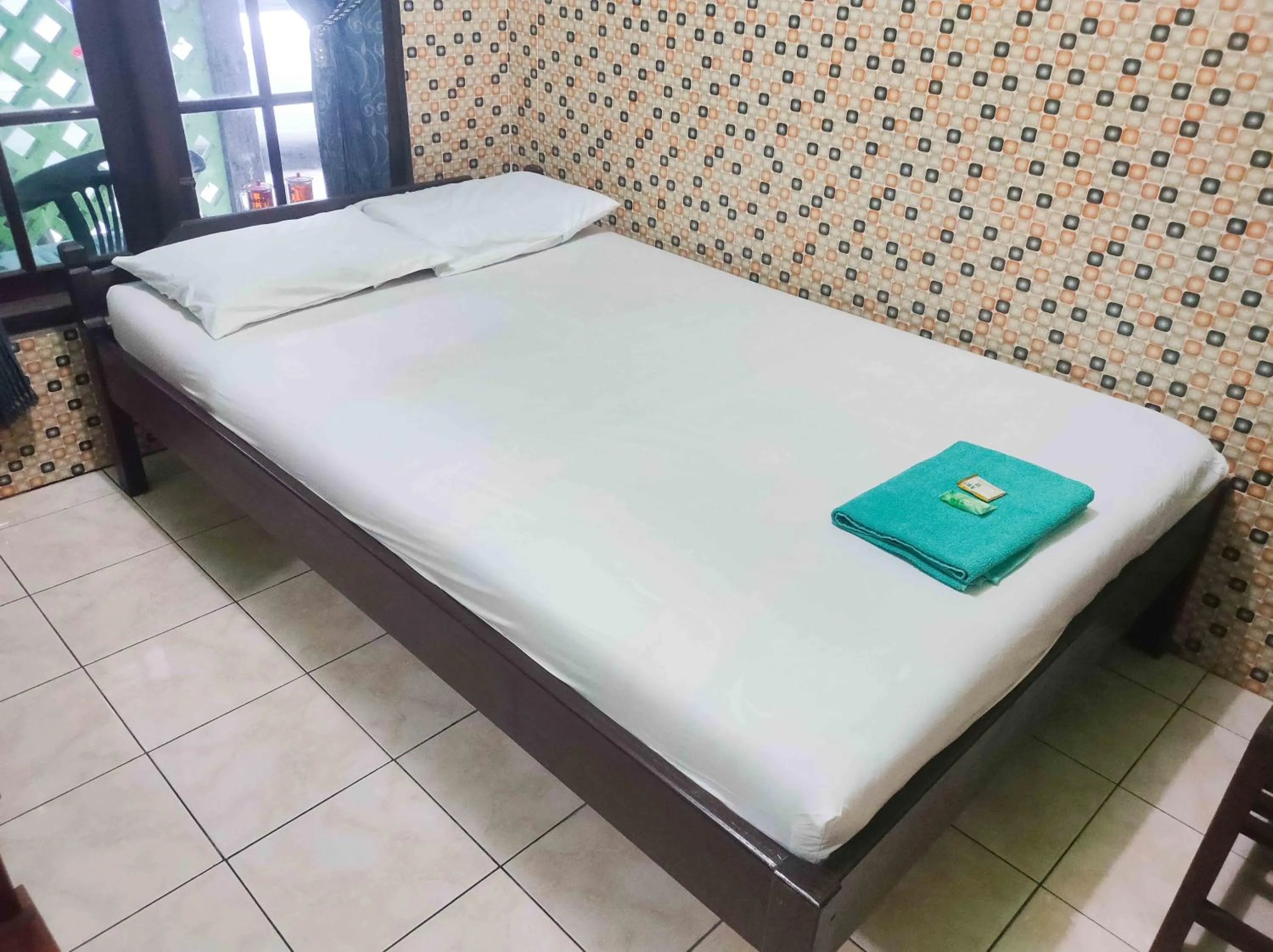 Bedroom, Bed in Bayu Murti Inn Kaliurang Yogyakarta RedPartner