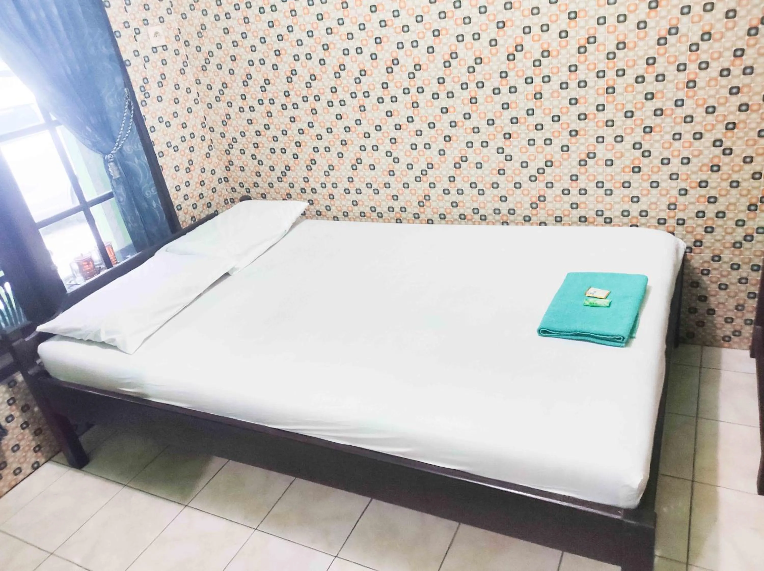 Bedroom, Bed in Bayu Murti Inn Kaliurang Yogyakarta RedPartner