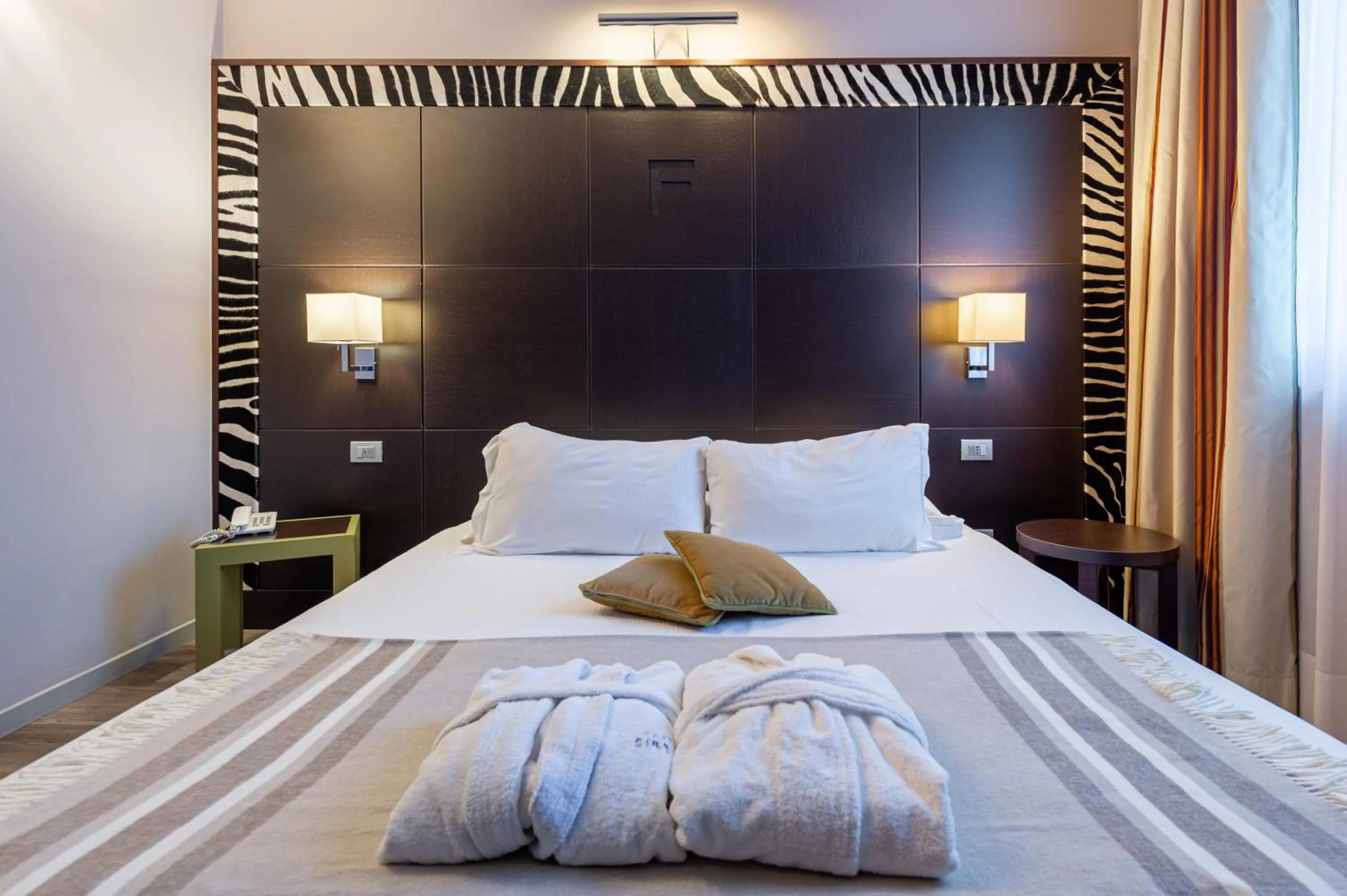 Bed in First Hotel Malpensa