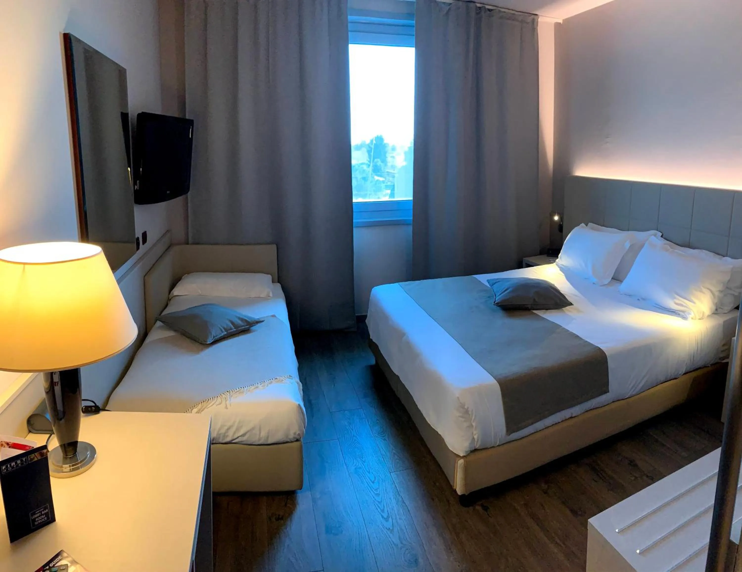 Bed in First Hotel Malpensa