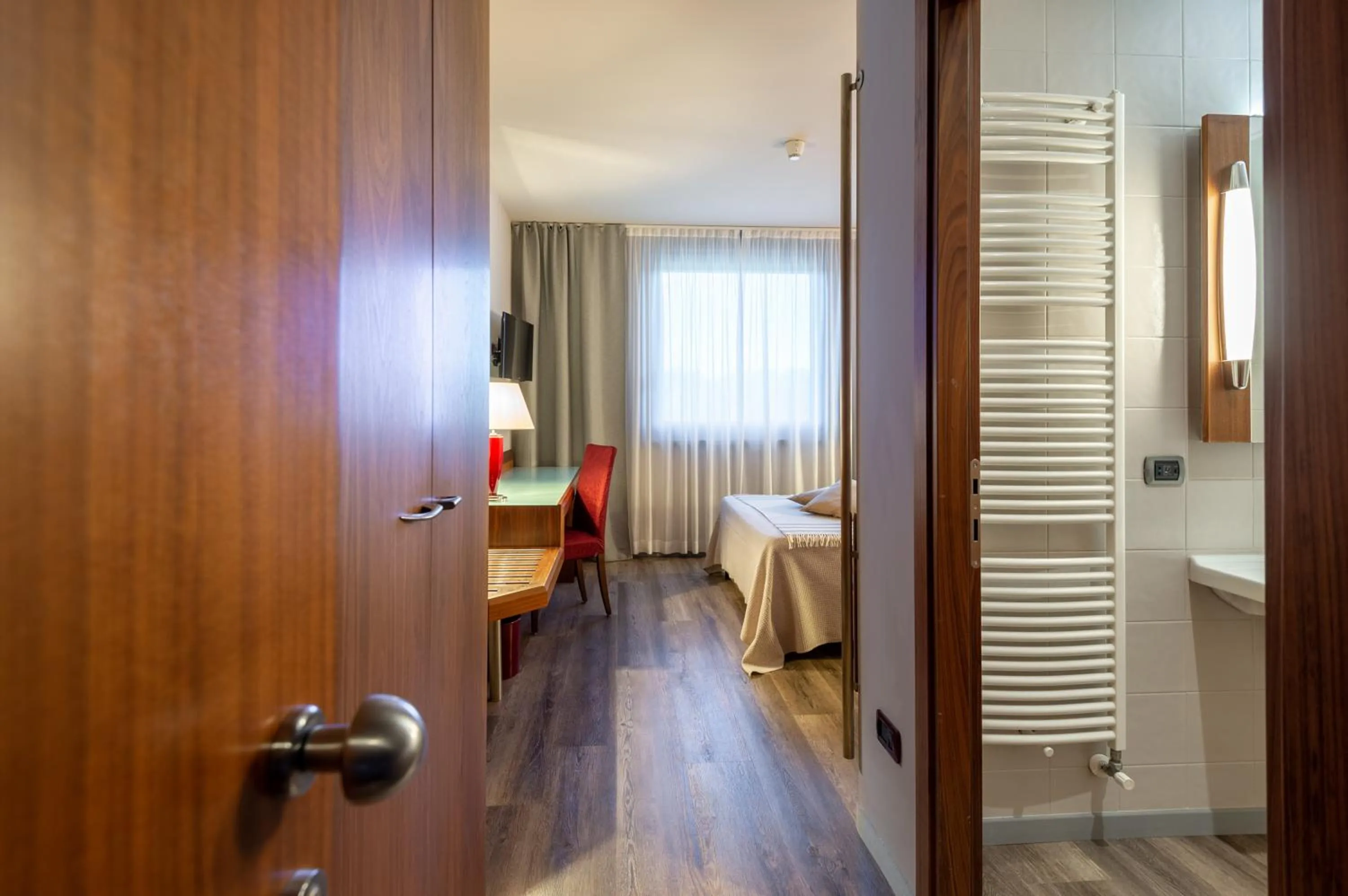 Photo of the whole room, Bed in First Hotel Malpensa
