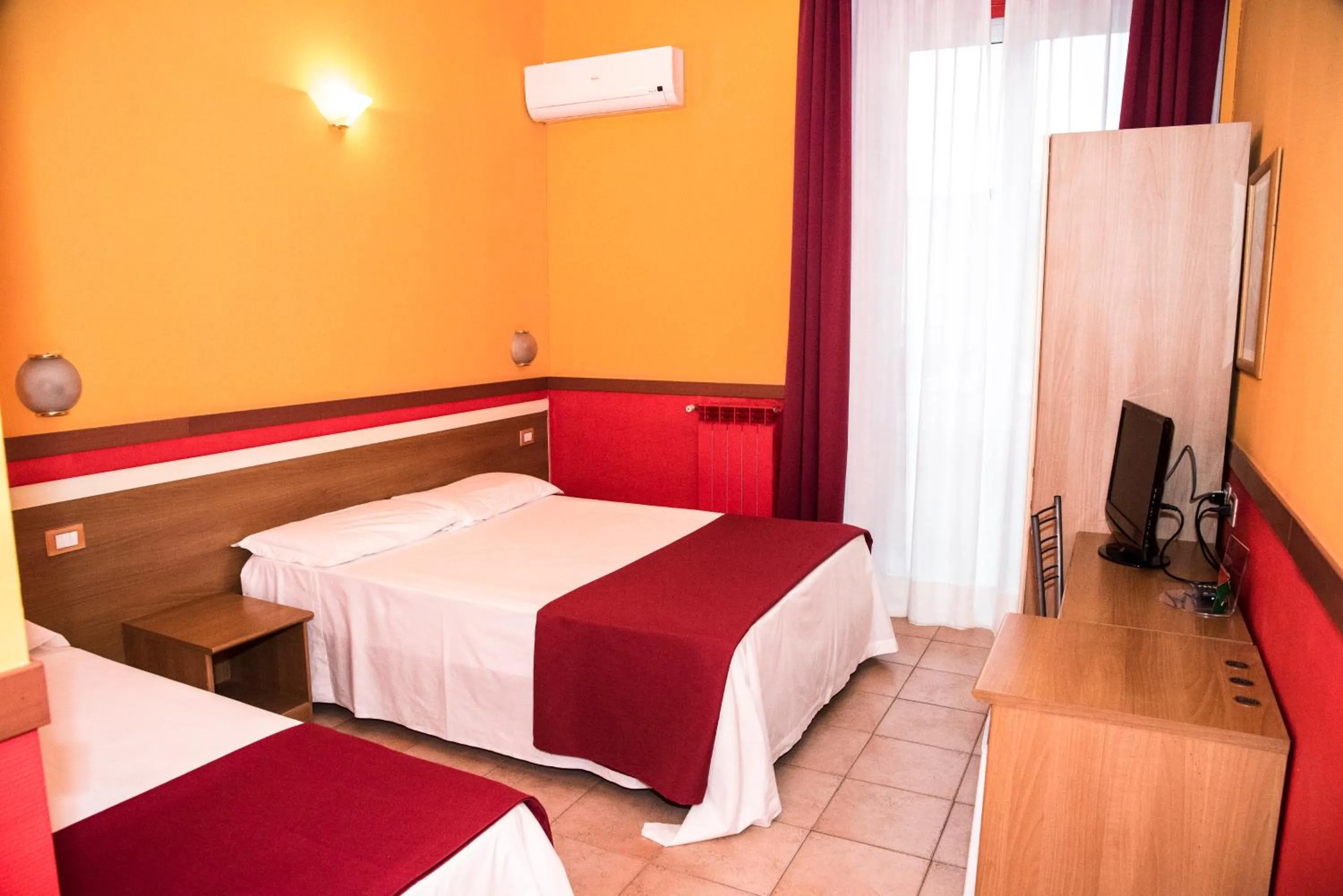 Bed in Hotel Corallo