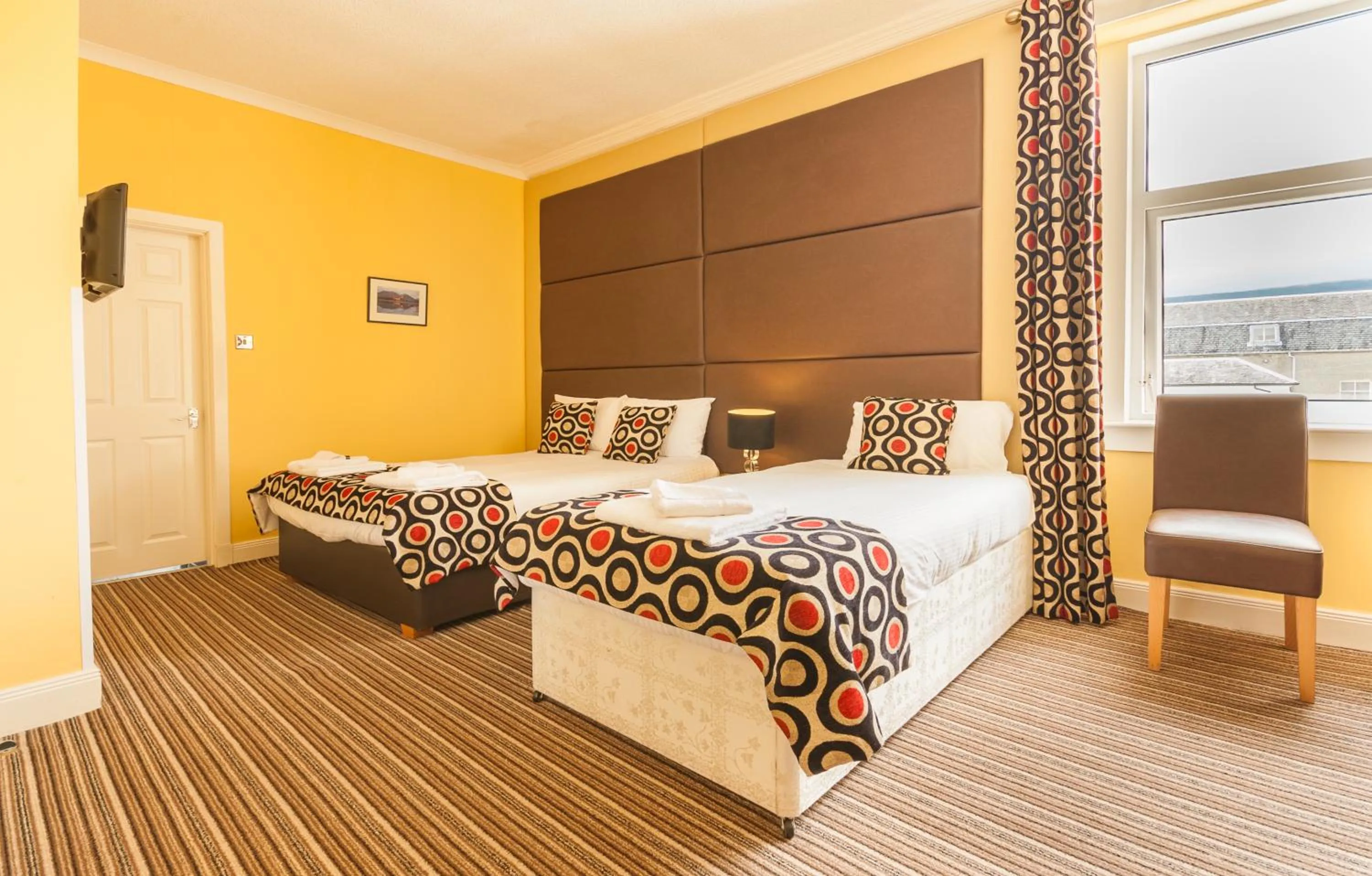 Bed in SGE Esplanade Hotel