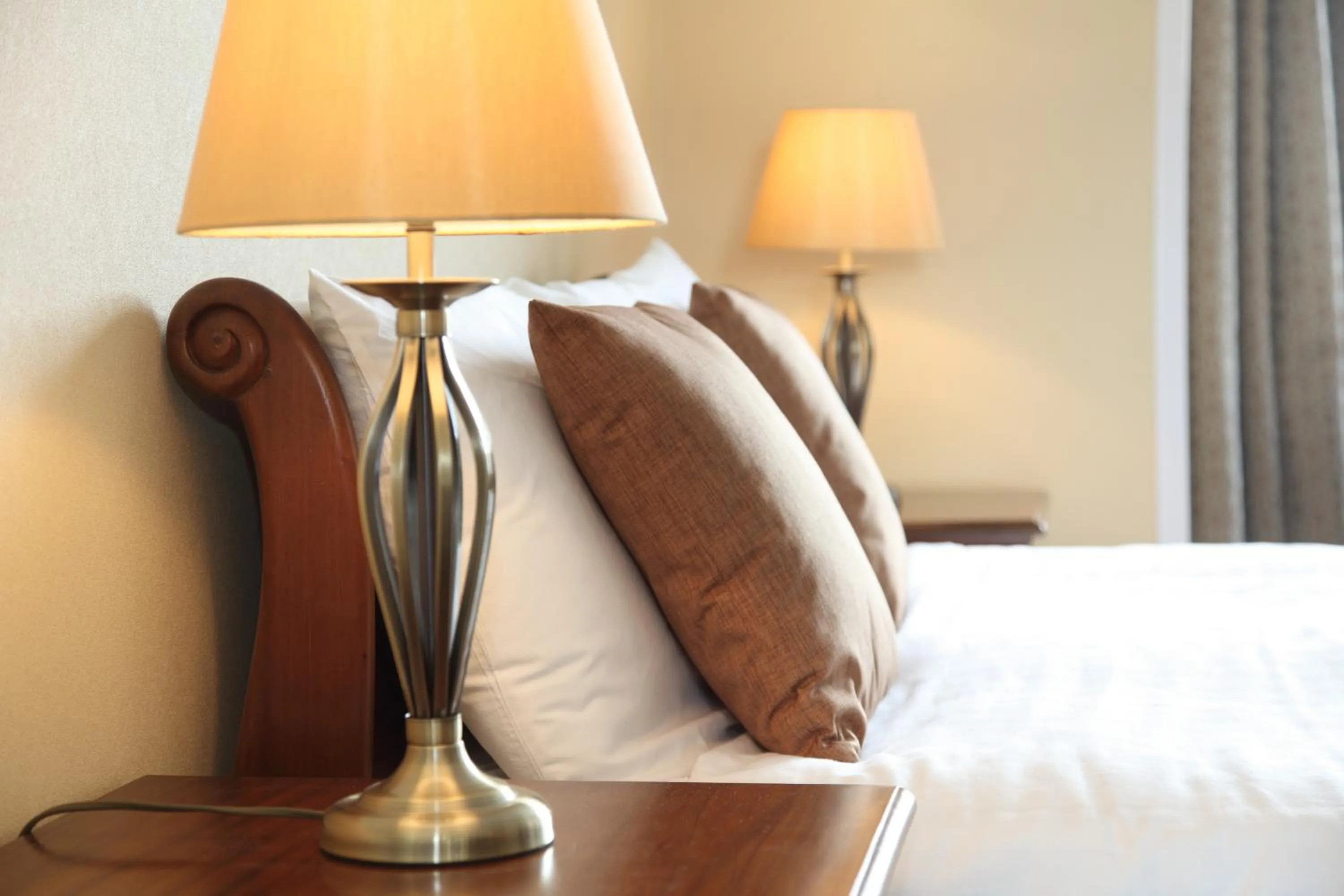 Bed in SGE Esplanade Hotel