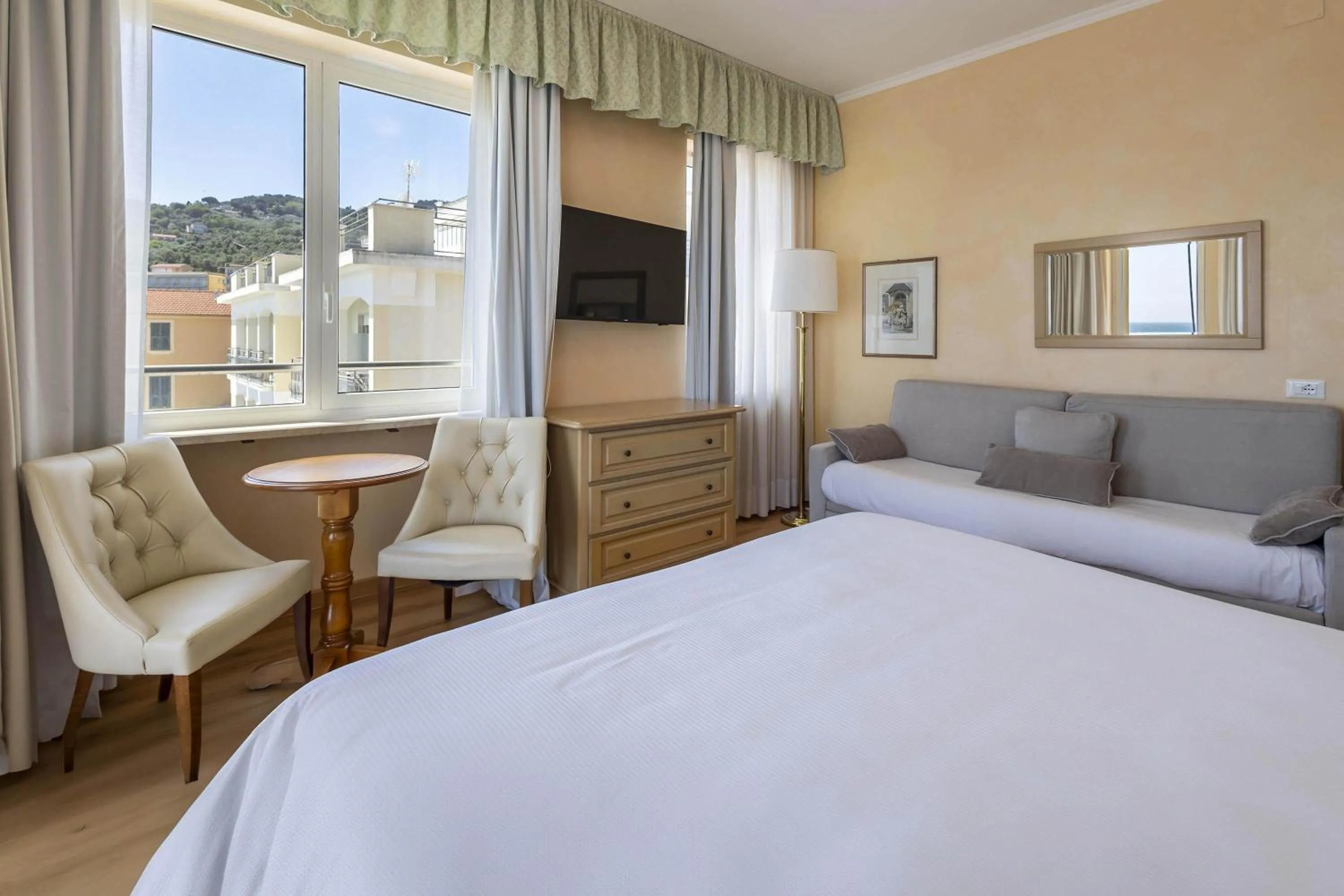 Photo of the whole room, Bed in B&B HOTEL Diano Marina Palace