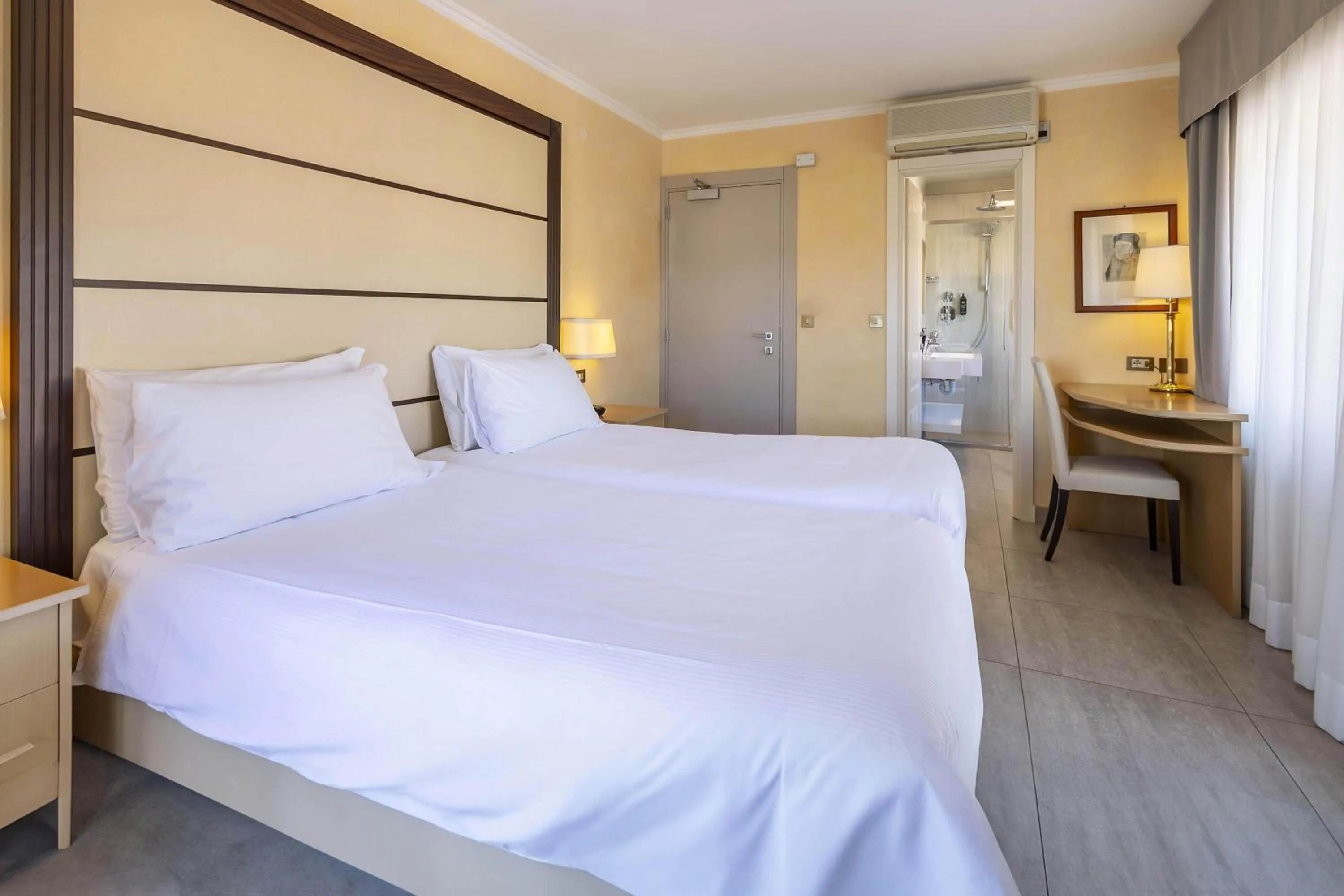 Photo of the whole room, Bed in B&B HOTEL Diano Marina Palace