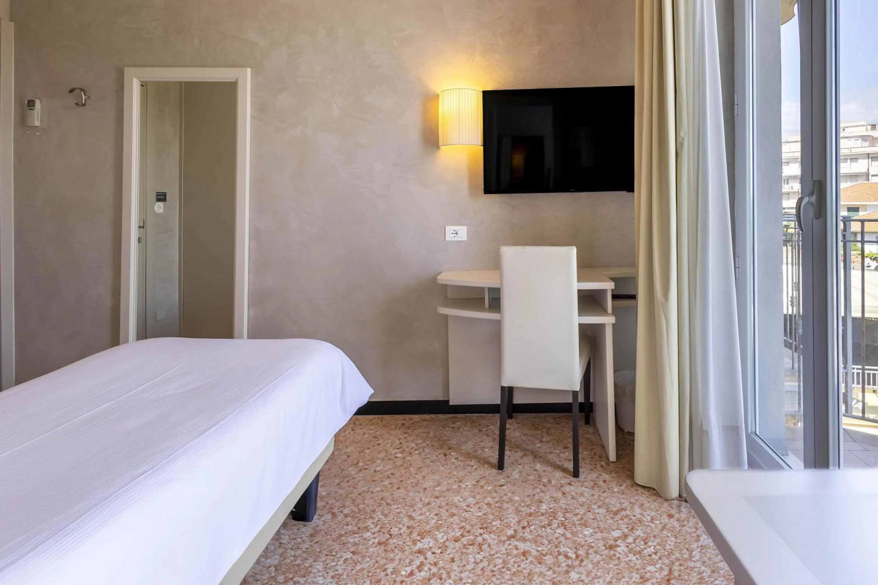 Photo of the whole room, Bed in B&B HOTEL Diano Marina Palace