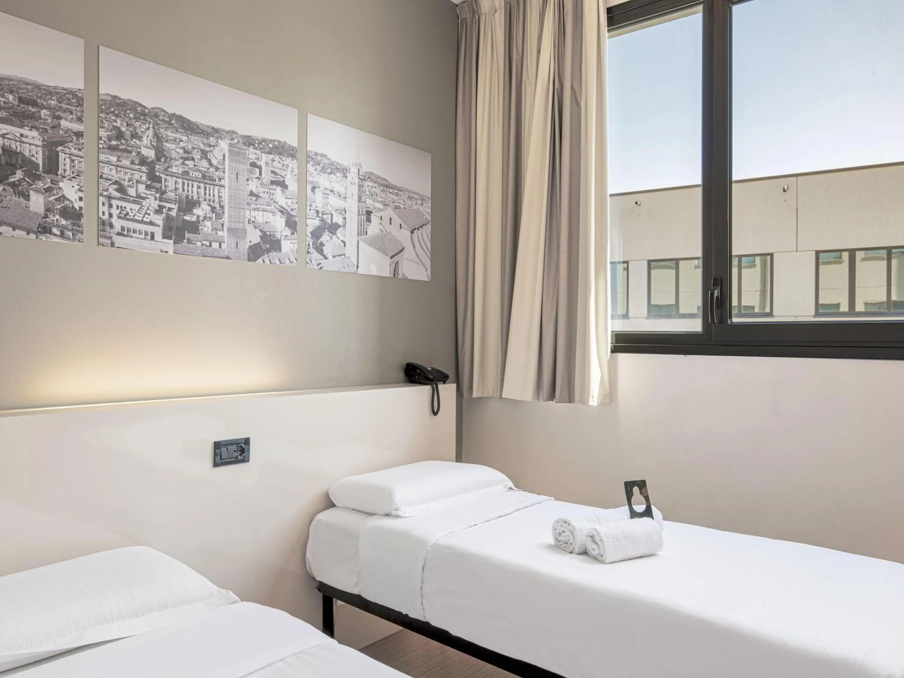 Bathroom, Bed in B&B HOTEL Bologna