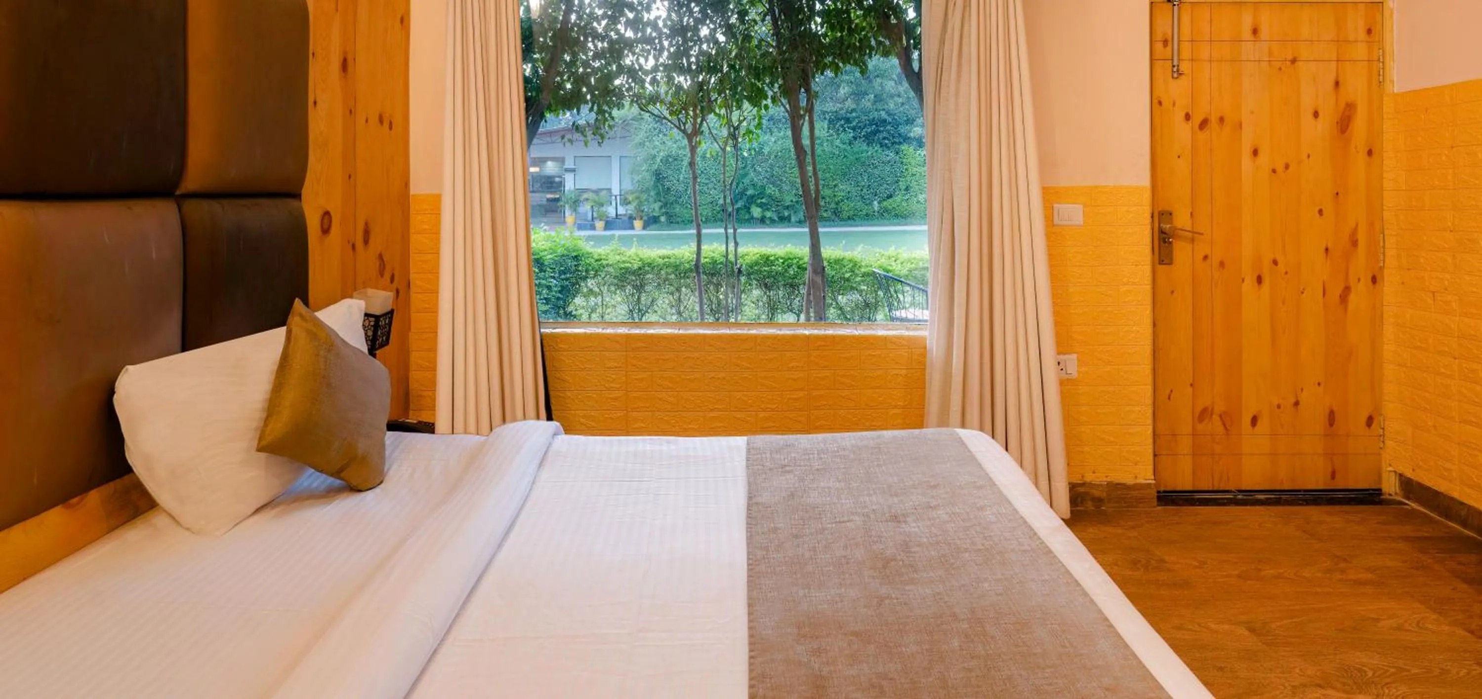 Bed in The Tattwaa Corbett Spa and Resort