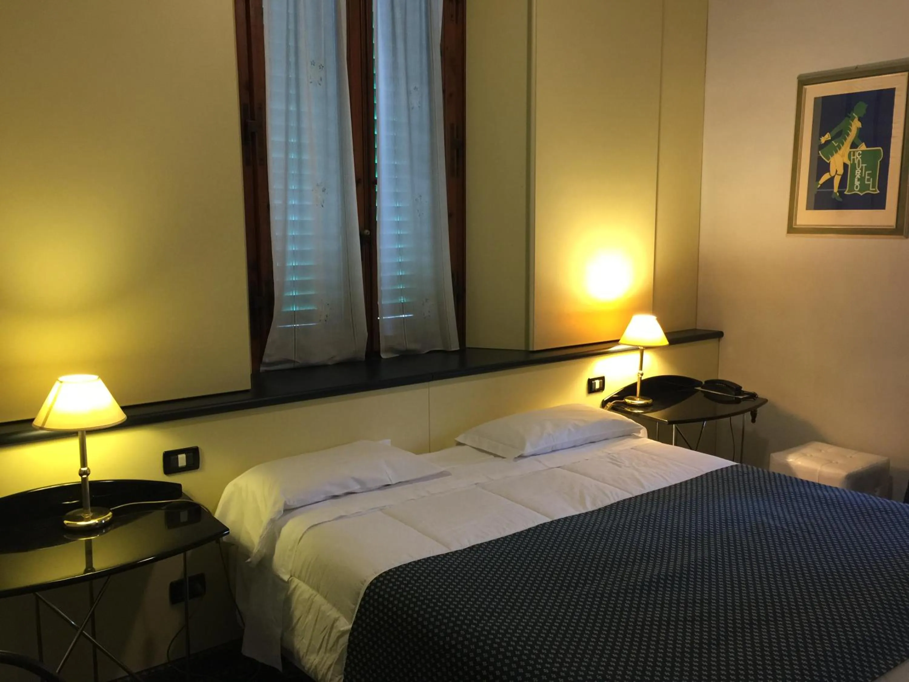 Bed in Hotel Corallo