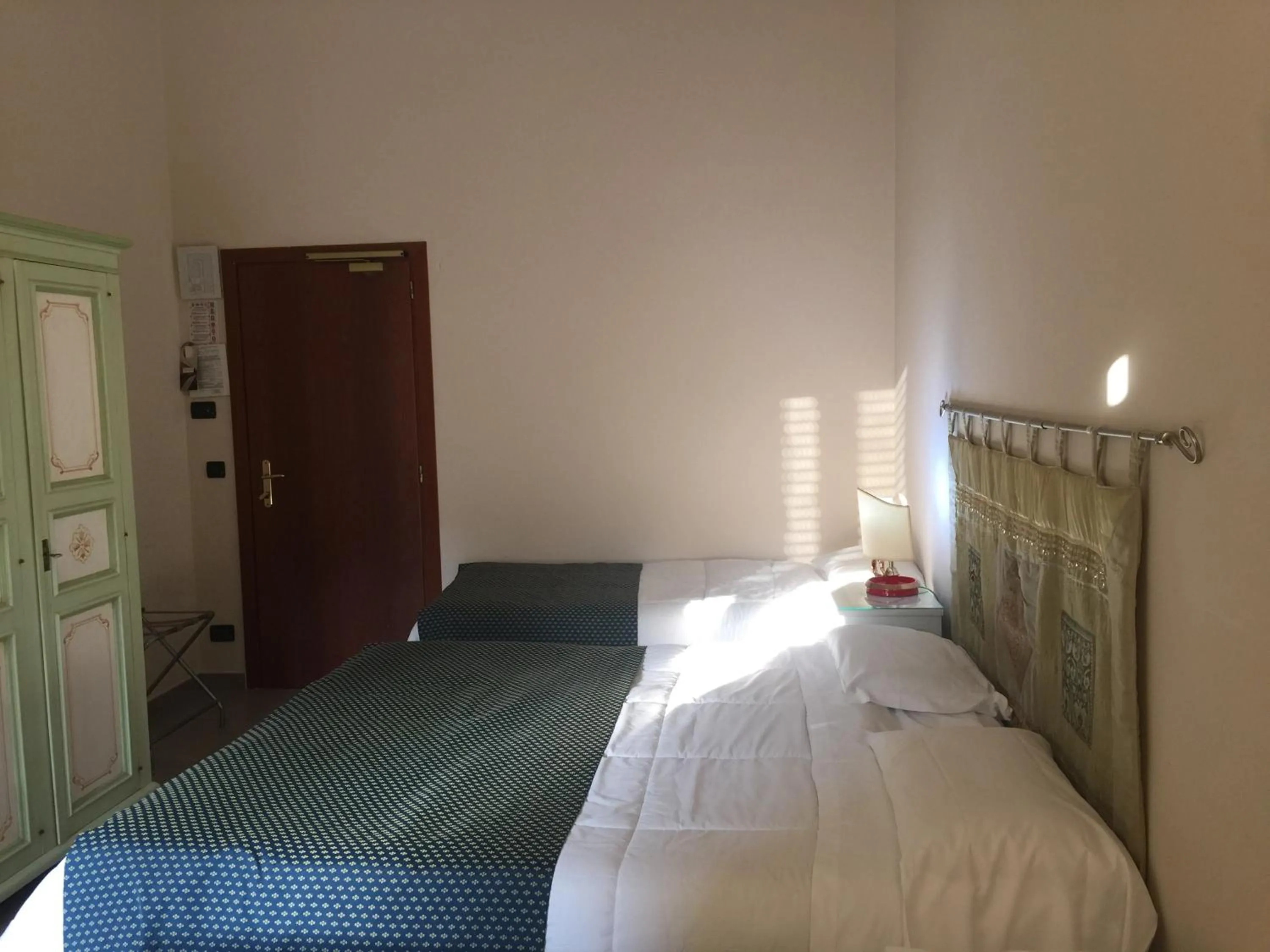 Bed in Hotel Corallo