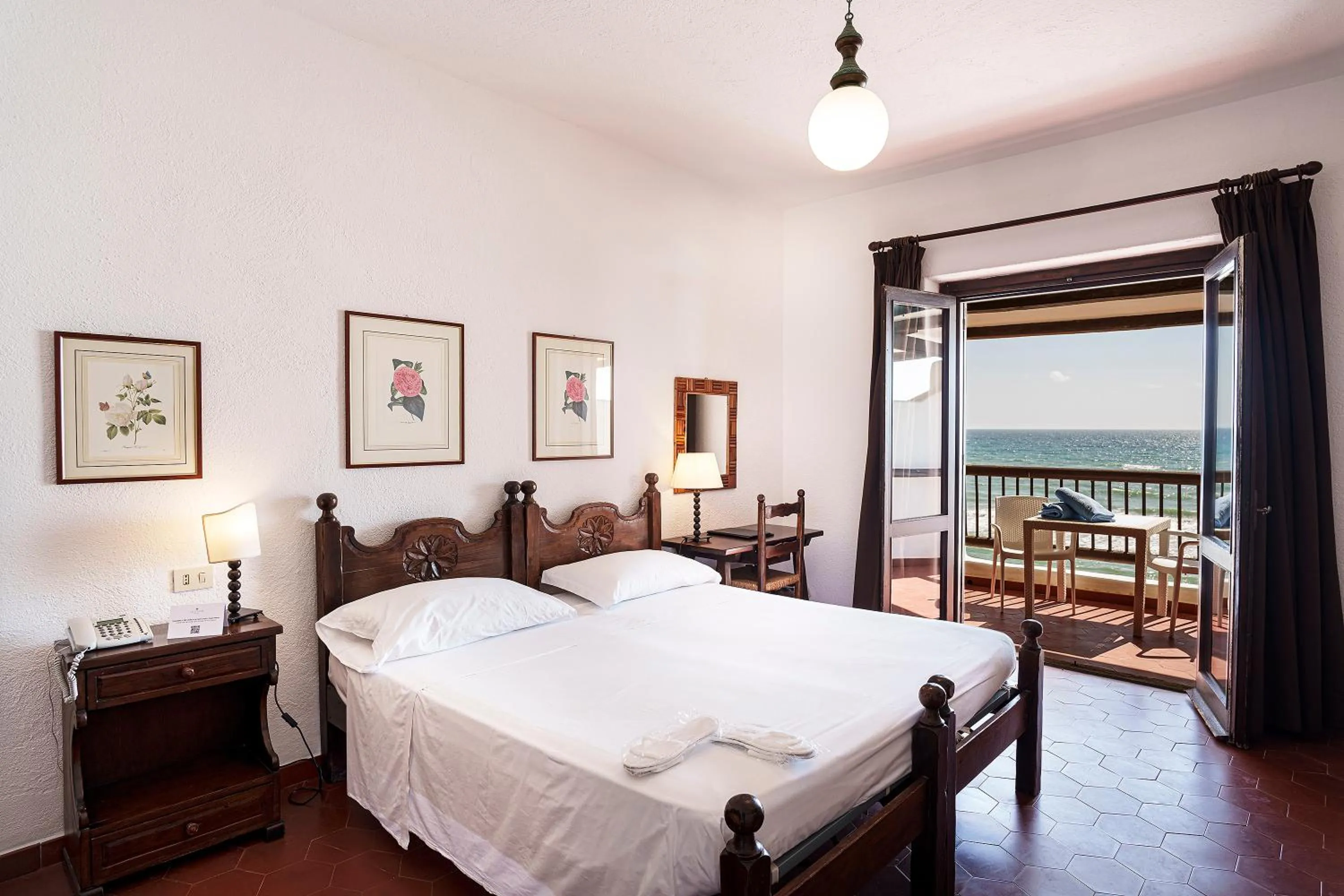 Bed in Hotel Le Dune