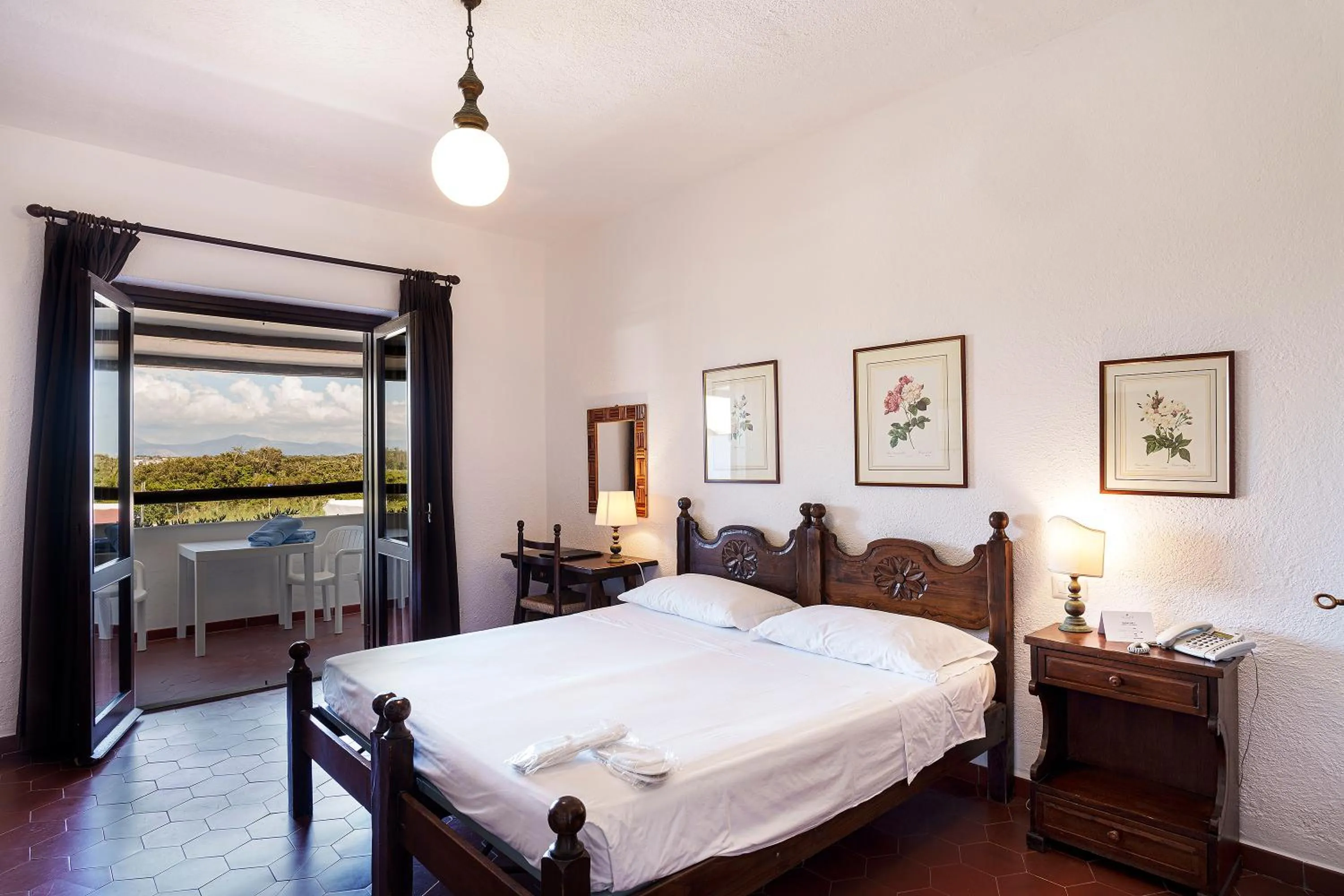 Bed in Hotel Le Dune