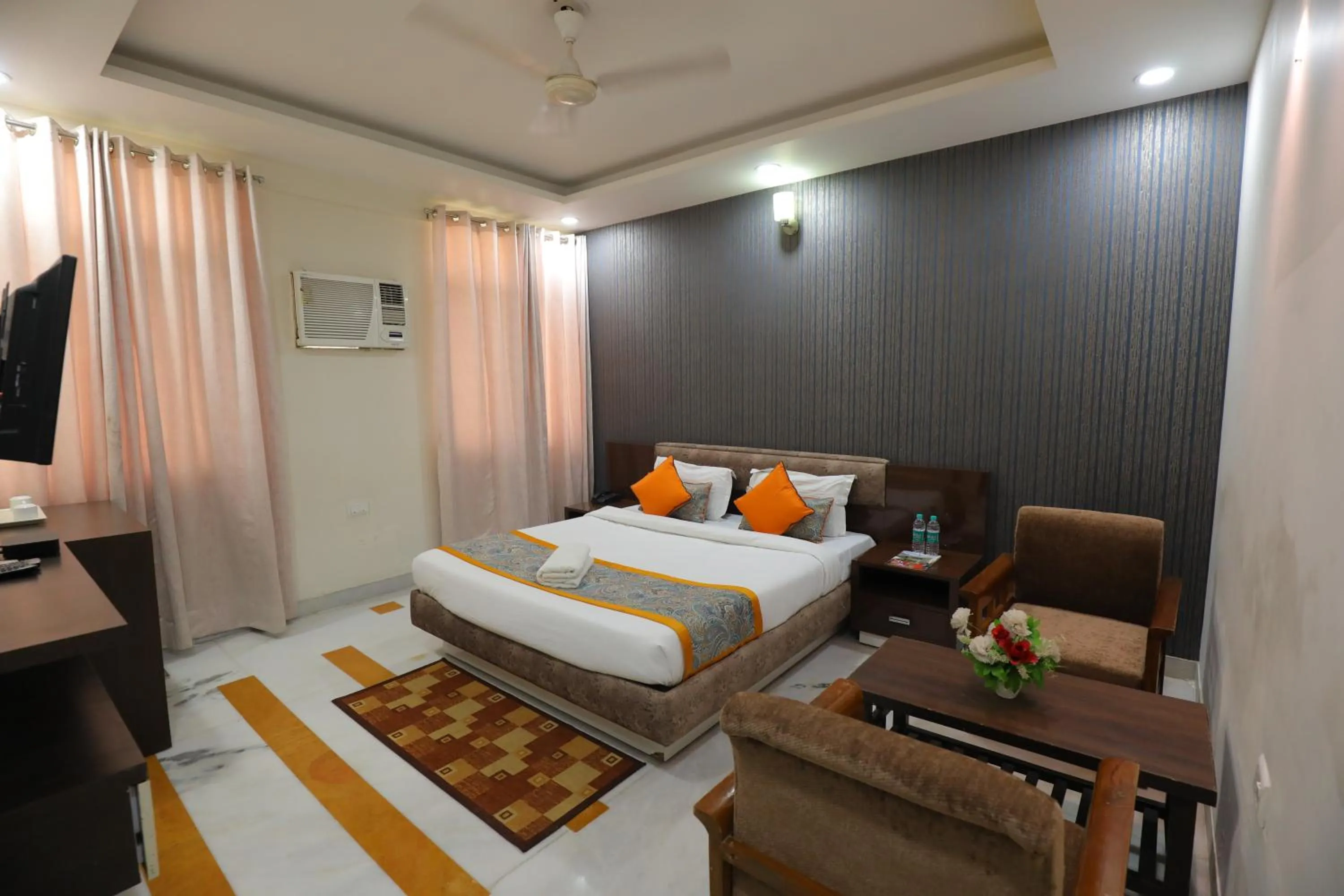 Bed in Meera Madhav Resort