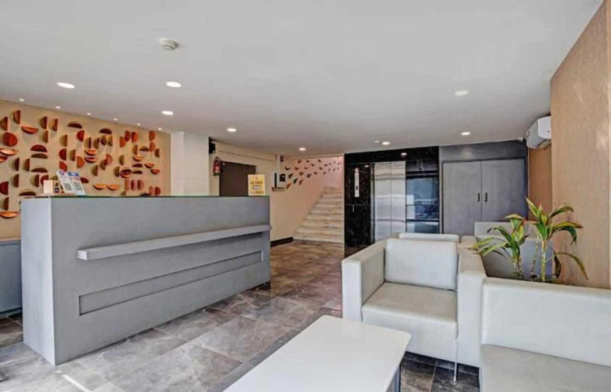 Lobby or reception in Alba Premier, Ahmedabad