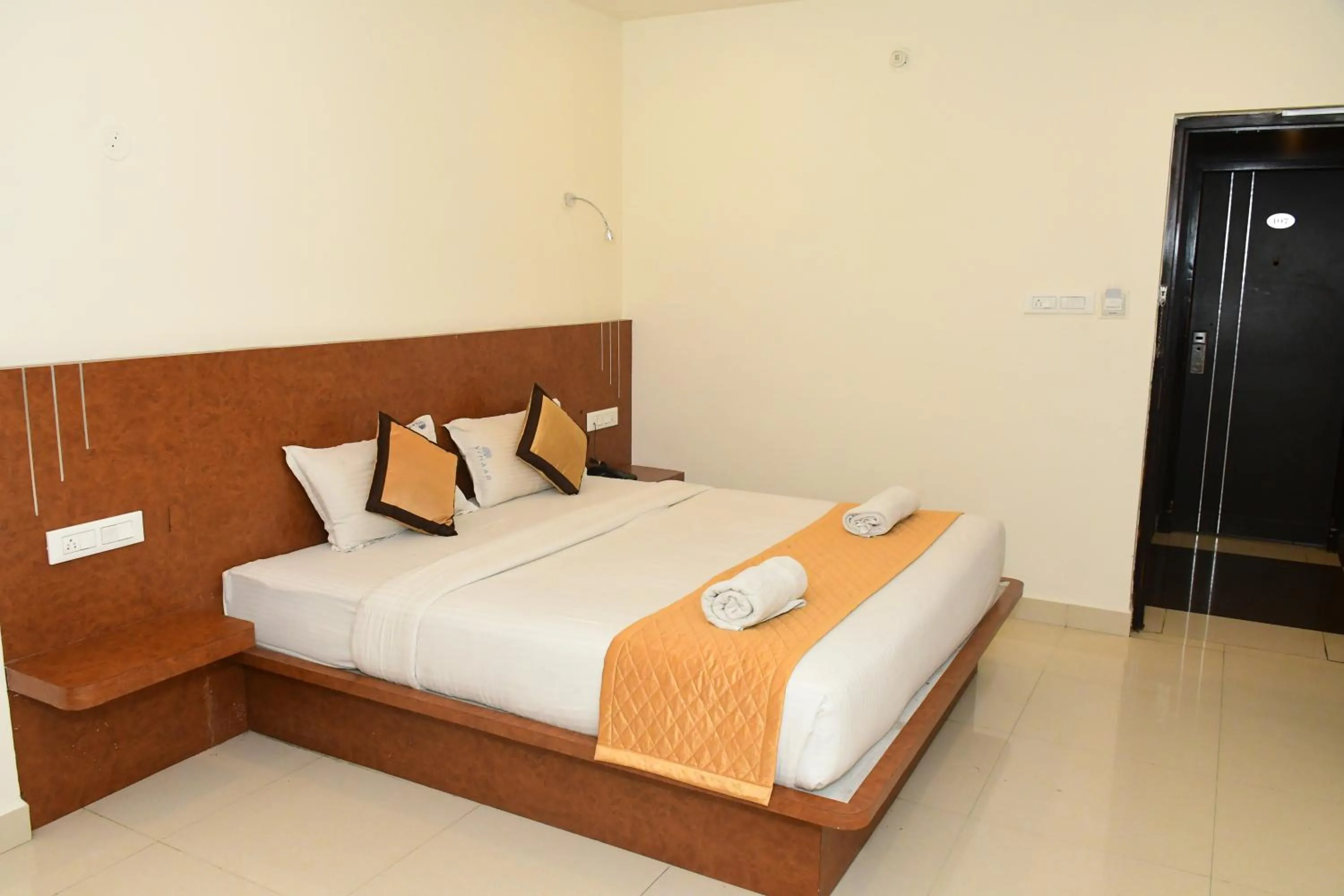 Bedroom, Bed in Sai Vihaar Inn & Suites
