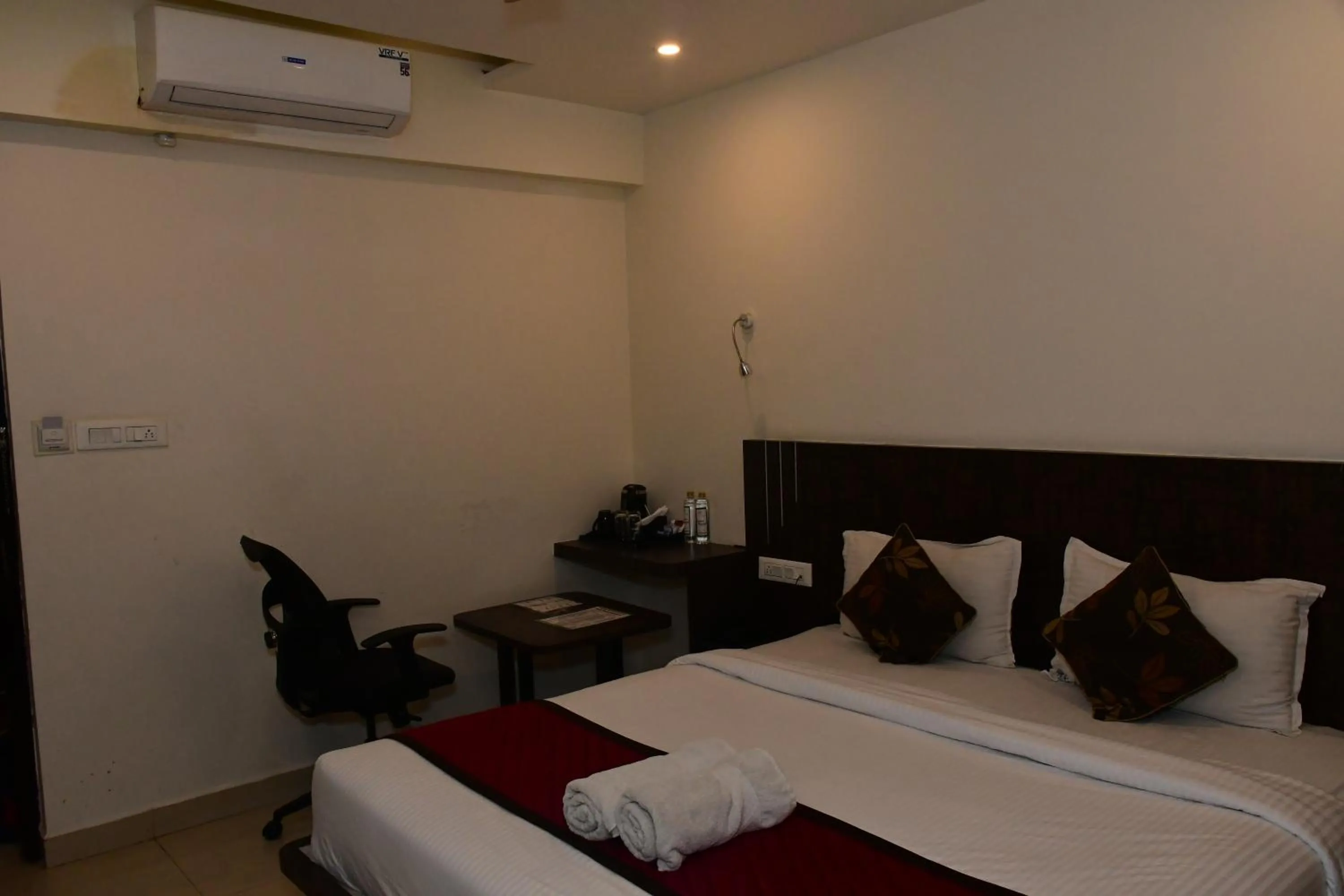 Bedroom, Bed in Sai Vihaar Inn & Suites
