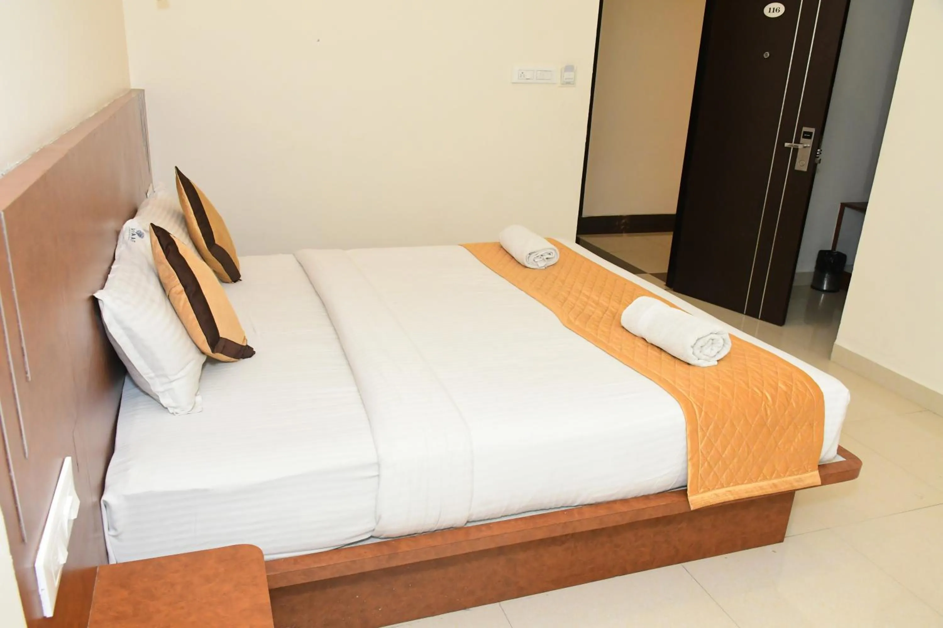 Photo of the whole room, Bed in Sai Vihaar Inn & Suites