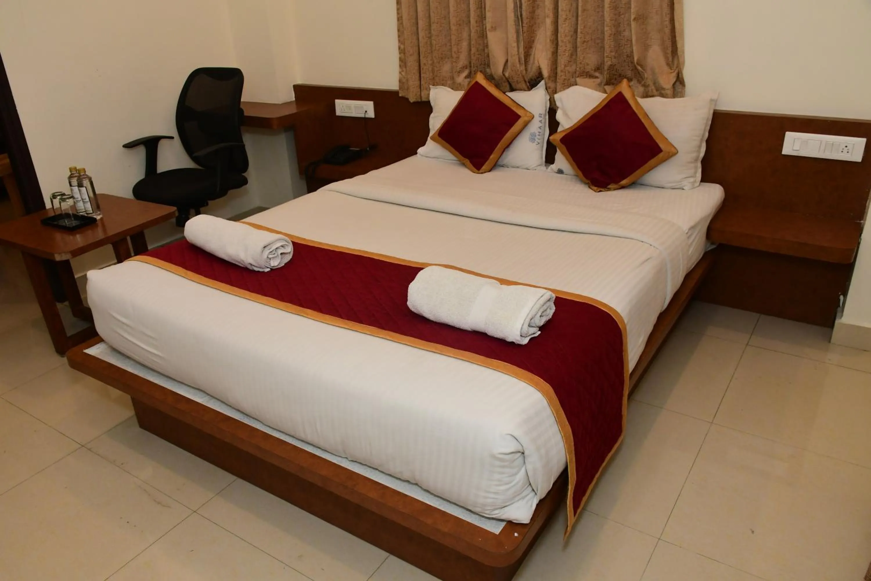 Bedroom, Bed in Sai Vihaar Inn & Suites