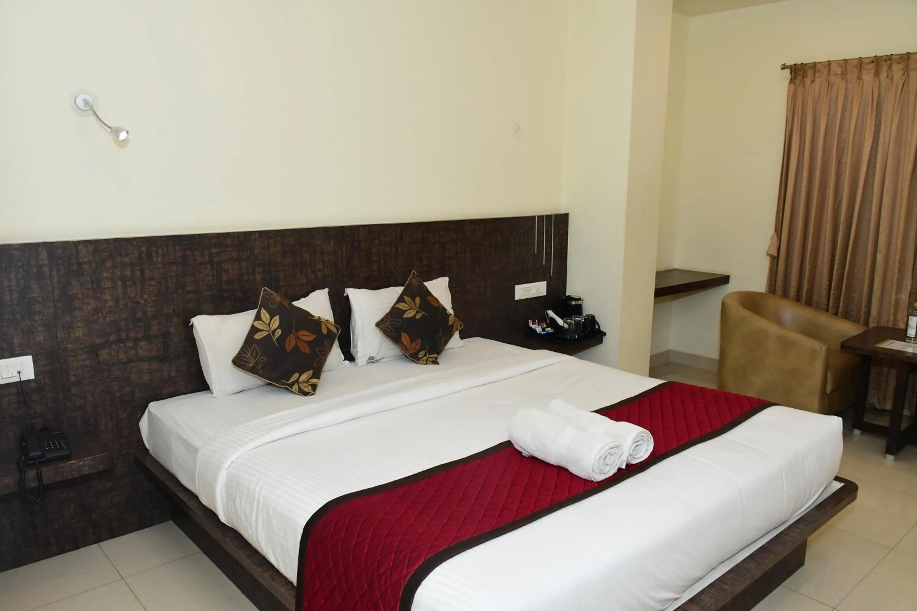 Bedroom, Bed in Sai Vihaar Inn & Suites