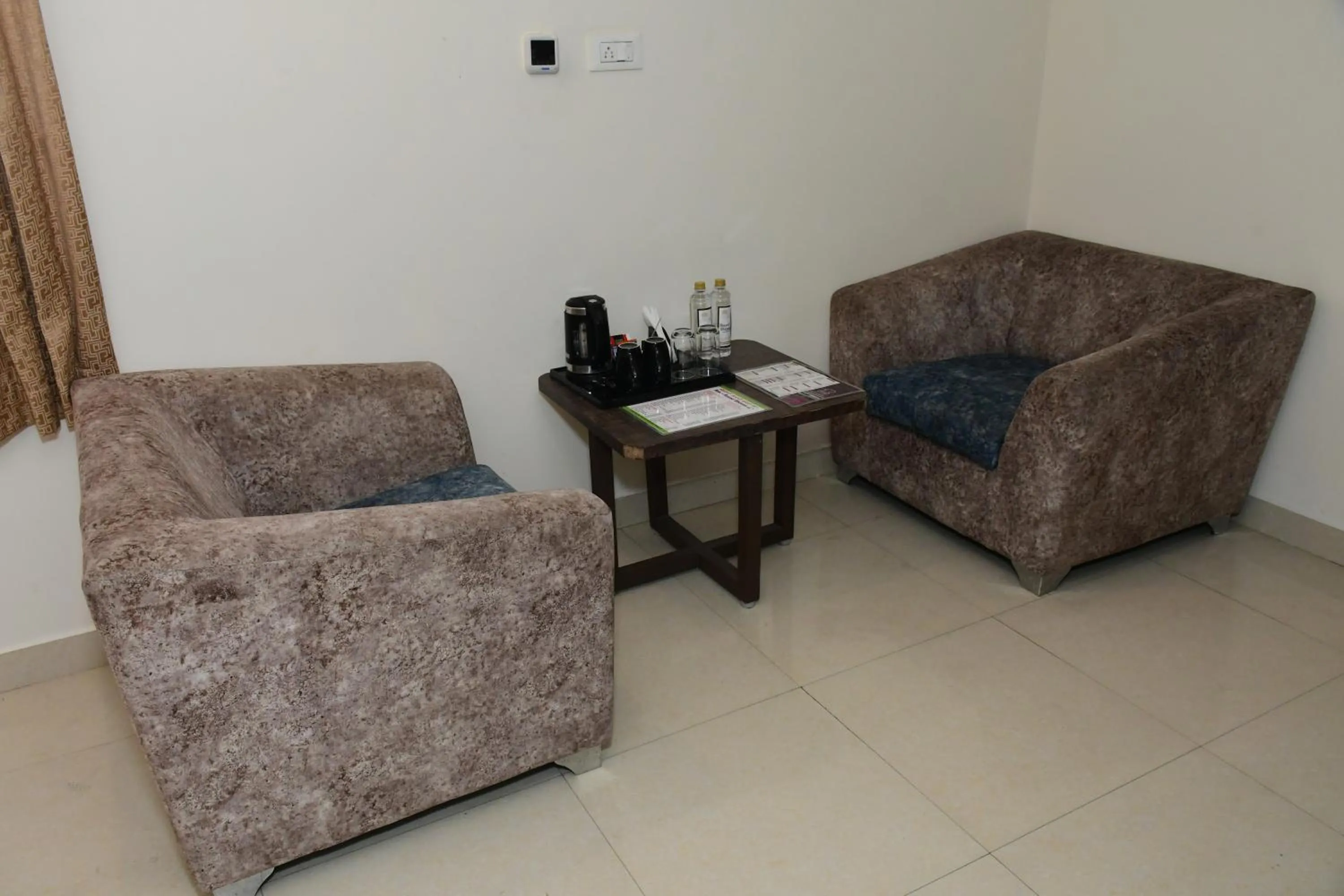 Seating area in Sai Vihaar Inn & Suites