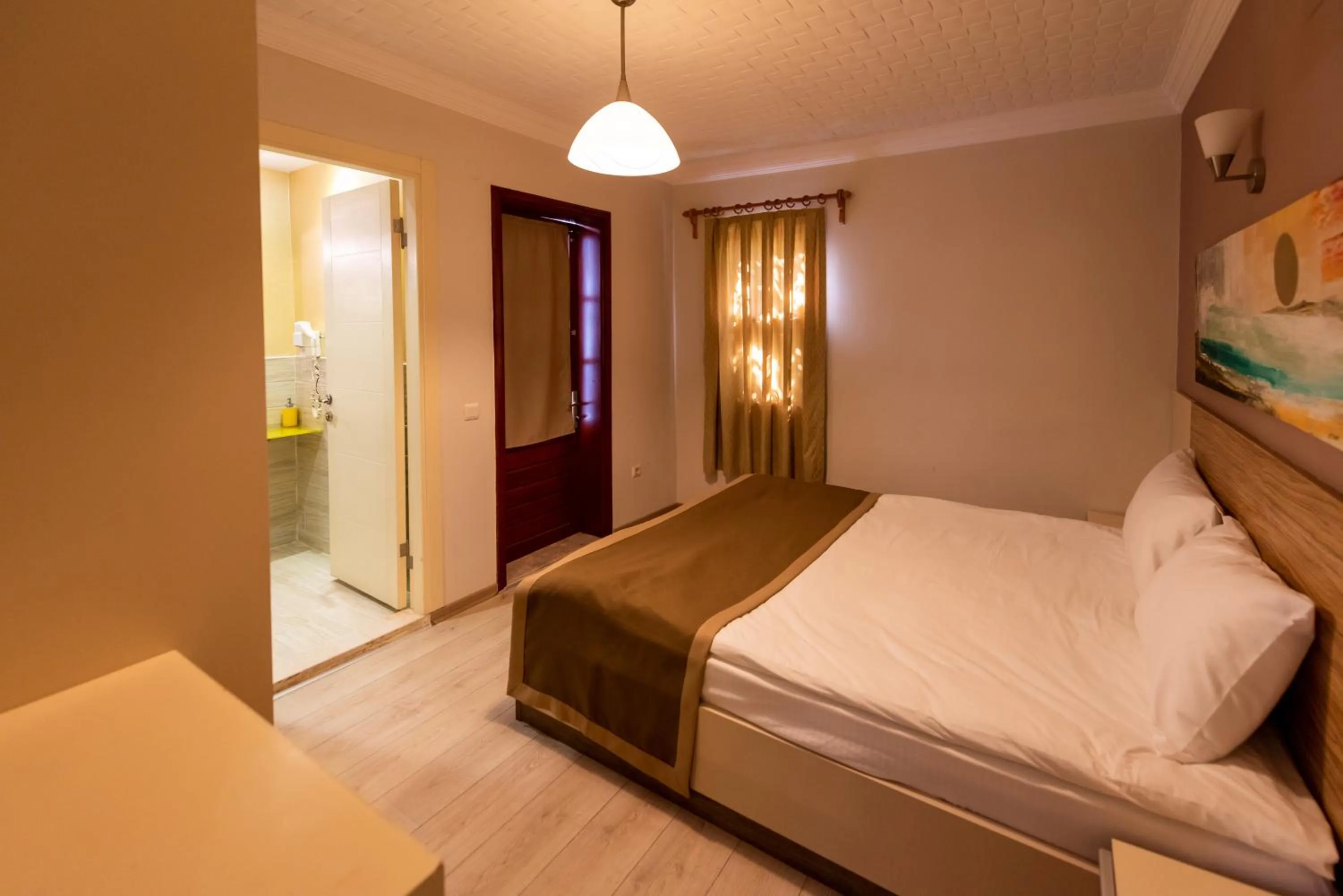 Bed in Vira Suites Hotel