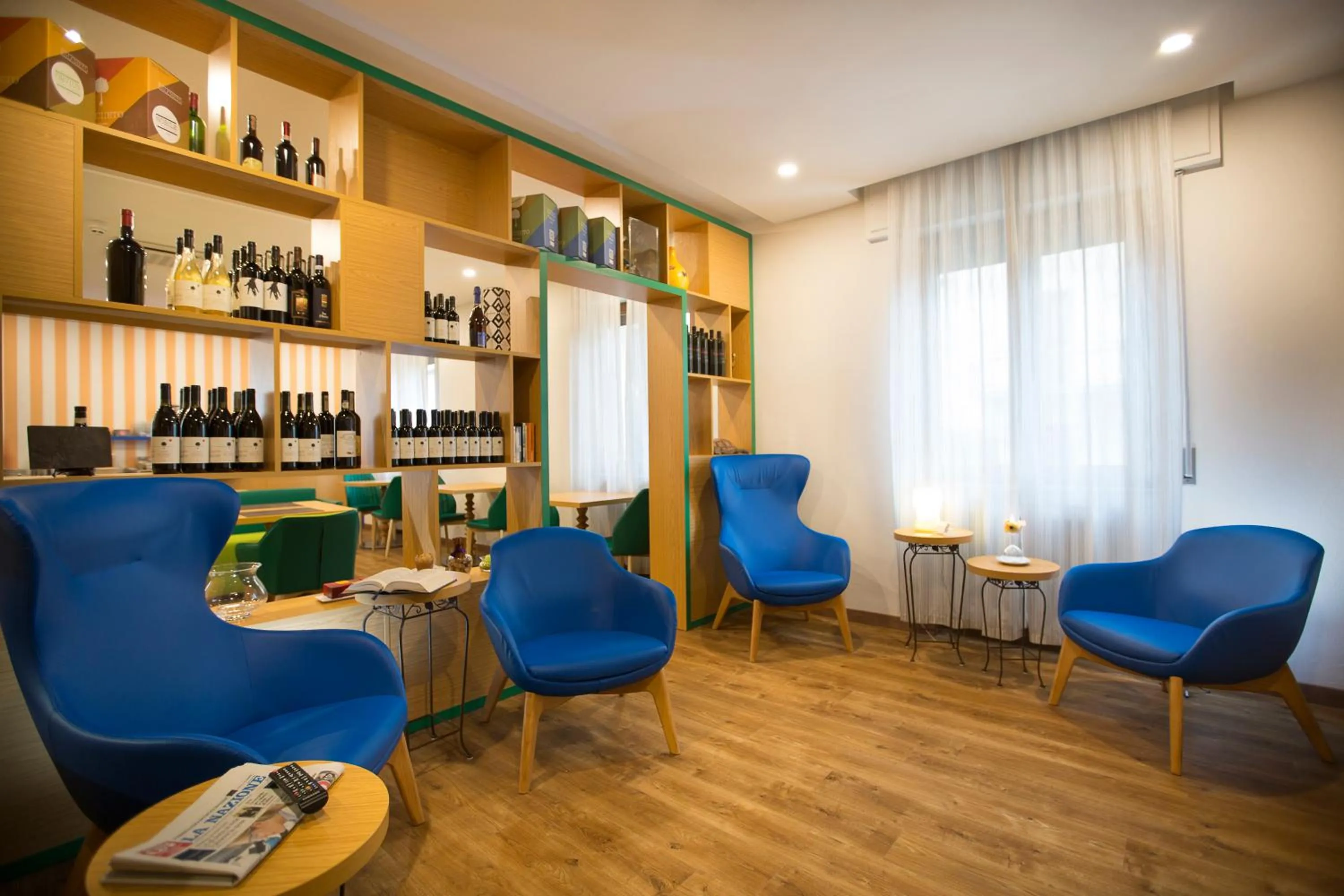 Communal lounge/ TV room in La Gustea Hotel & Cucina