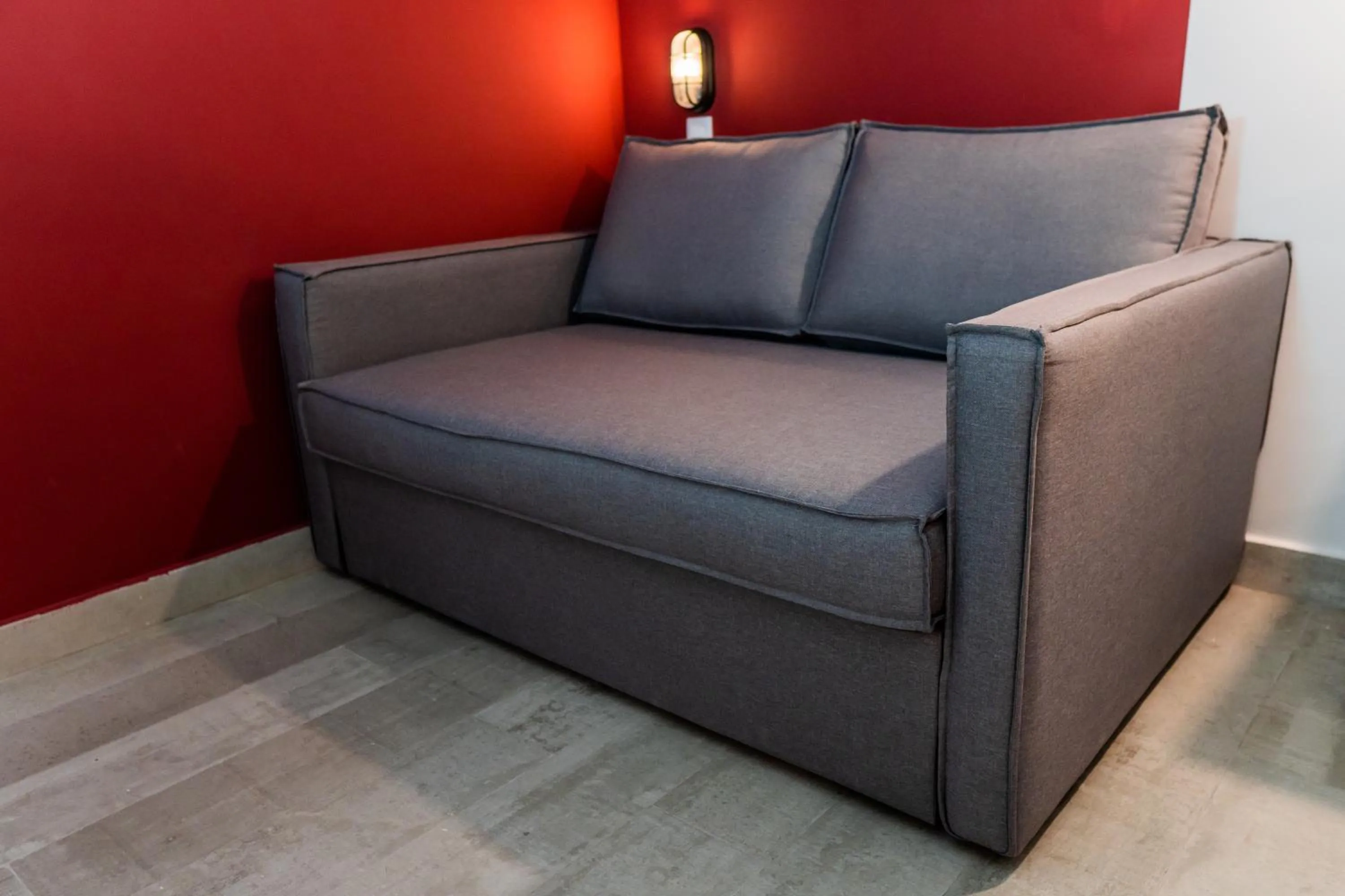 Living room in Front Comfort Teófilo Otoni