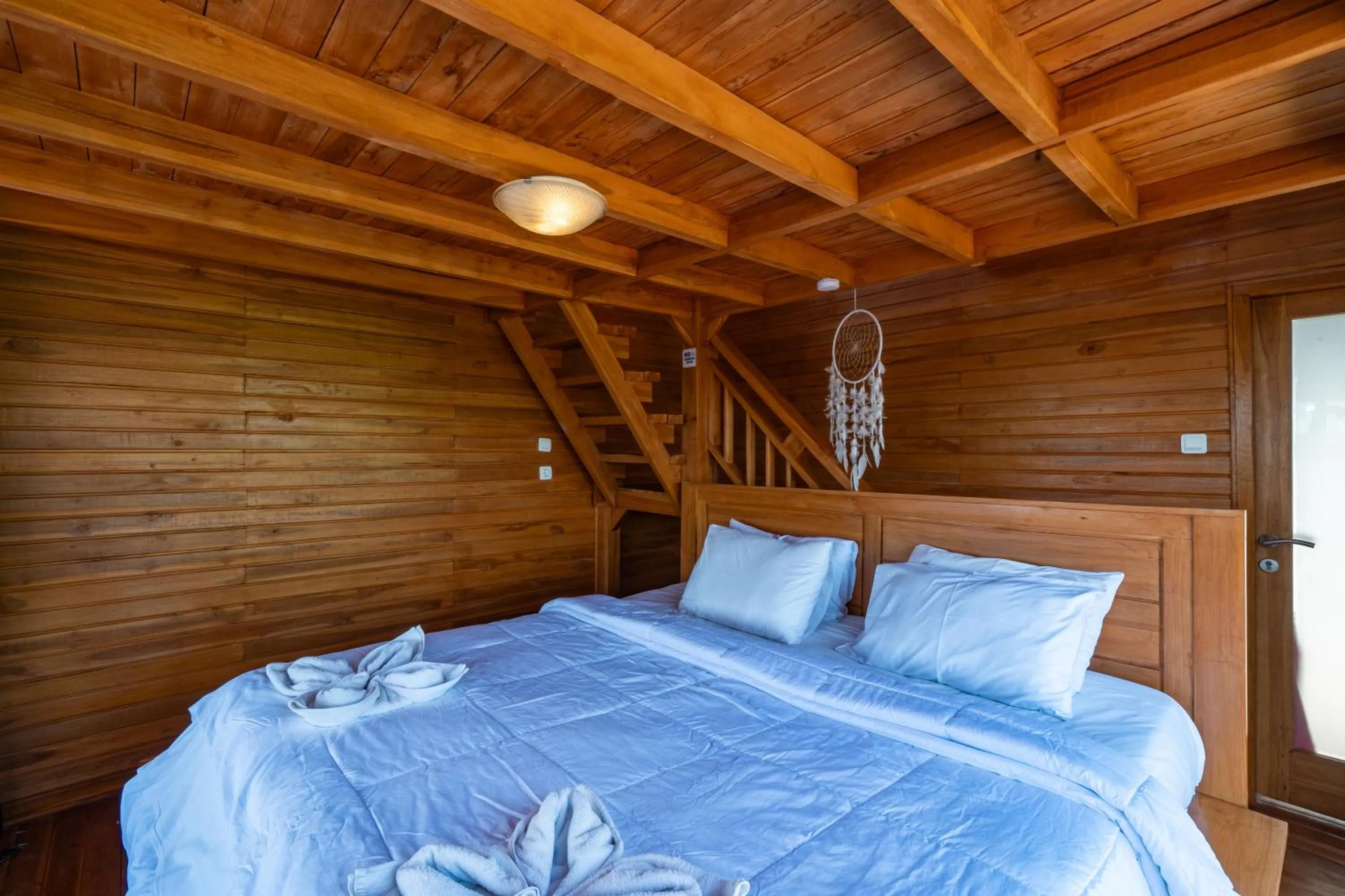 Bed in Butterfly Villas Nusa Ceningan