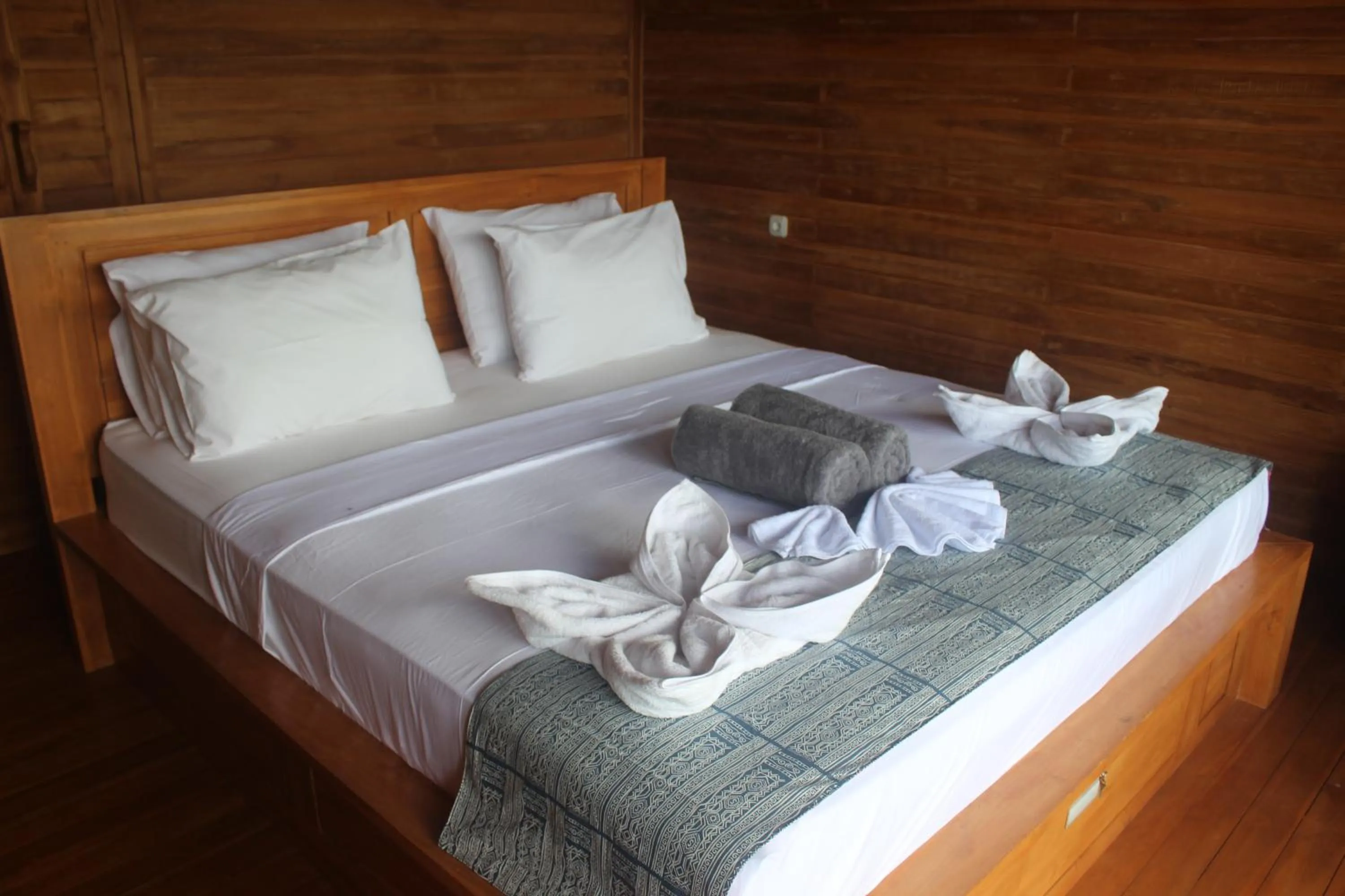Bed in Butterfly Villas Nusa Ceningan
