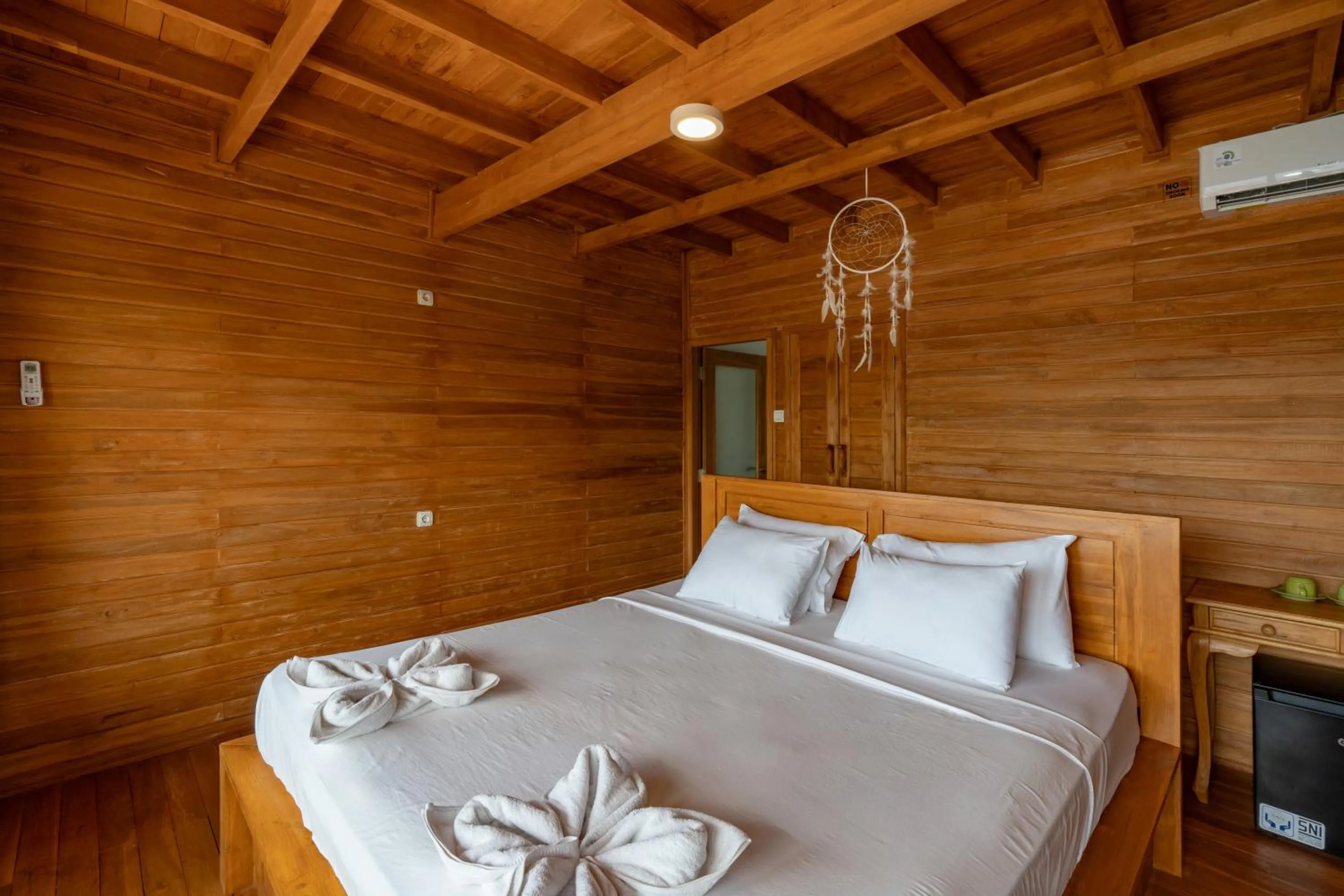 Bed in Butterfly Villas Nusa Ceningan