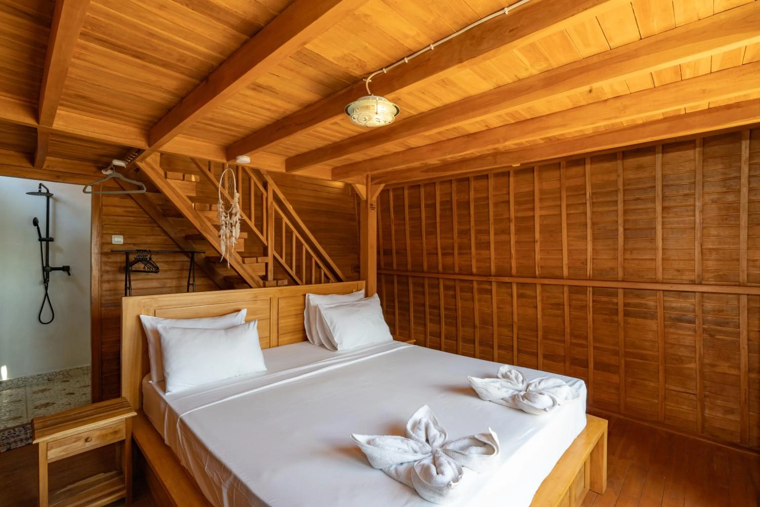 Bed in Butterfly Villas Nusa Ceningan