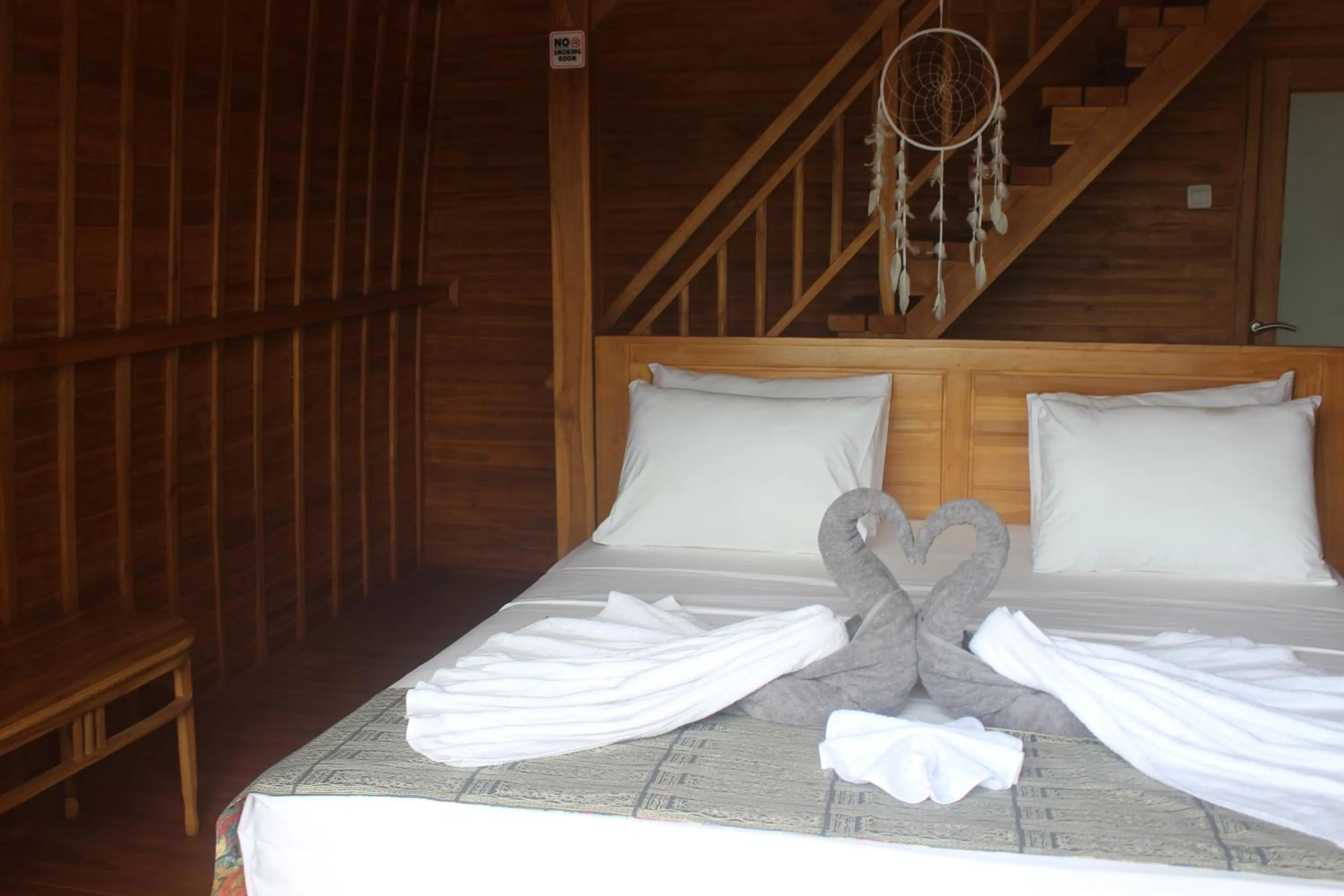 Bed in Butterfly Villas Nusa Ceningan