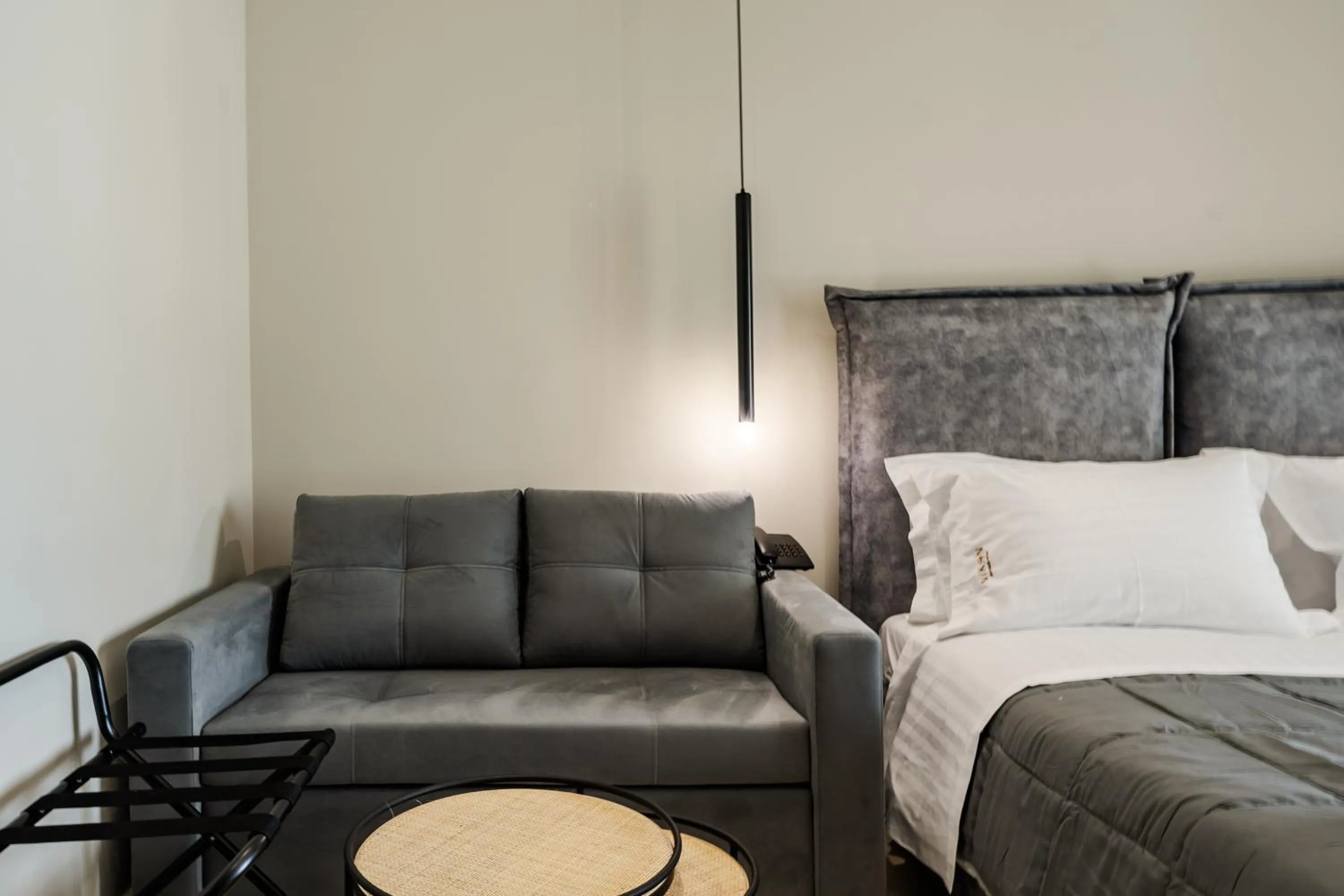 Seating area, Bed in Nikon Boutique Hotel